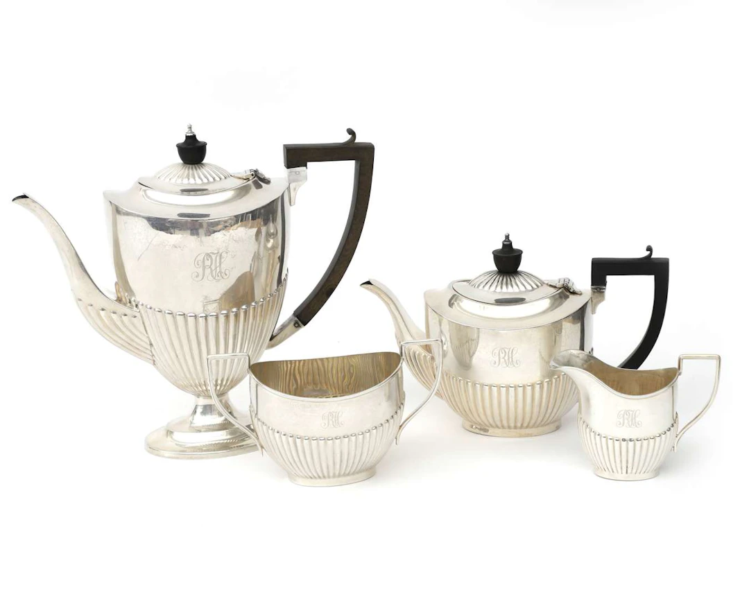 A four-piece silver coffee and tea set, England, Birmingham, 1917