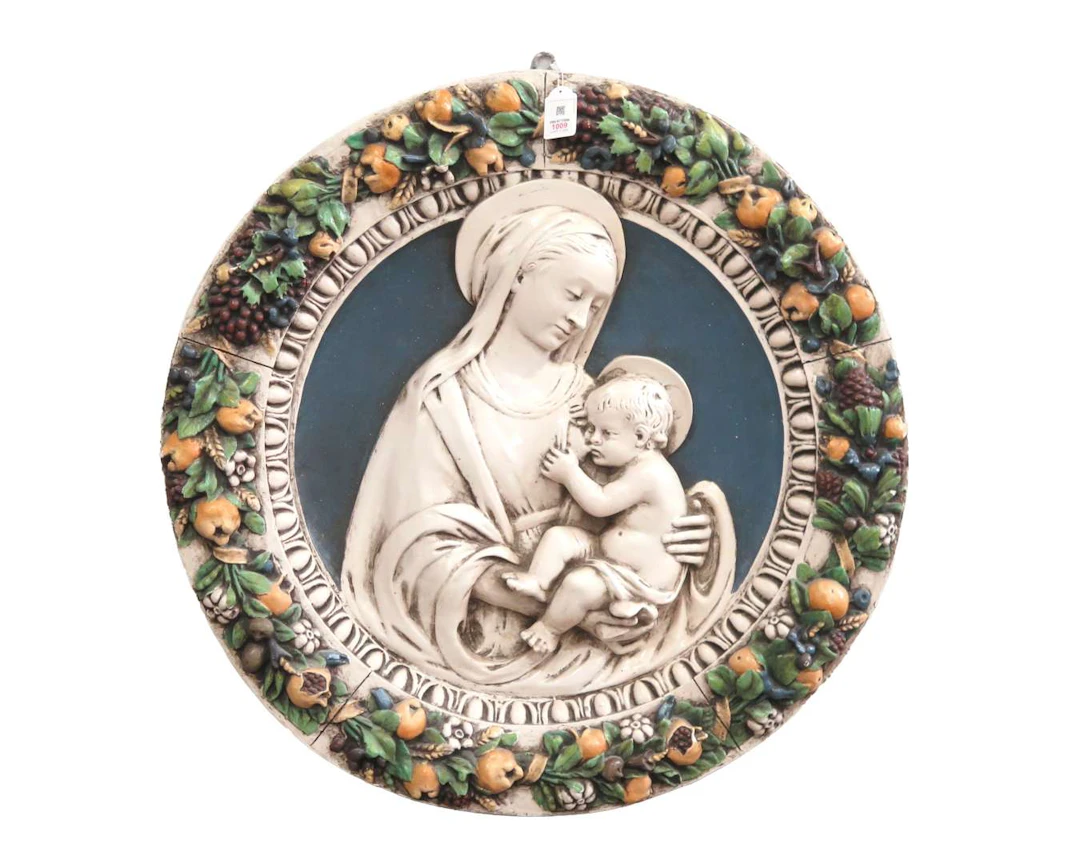 A circular ceramic wall relief. Madonna. Address: Kunsthandel Gheestelic