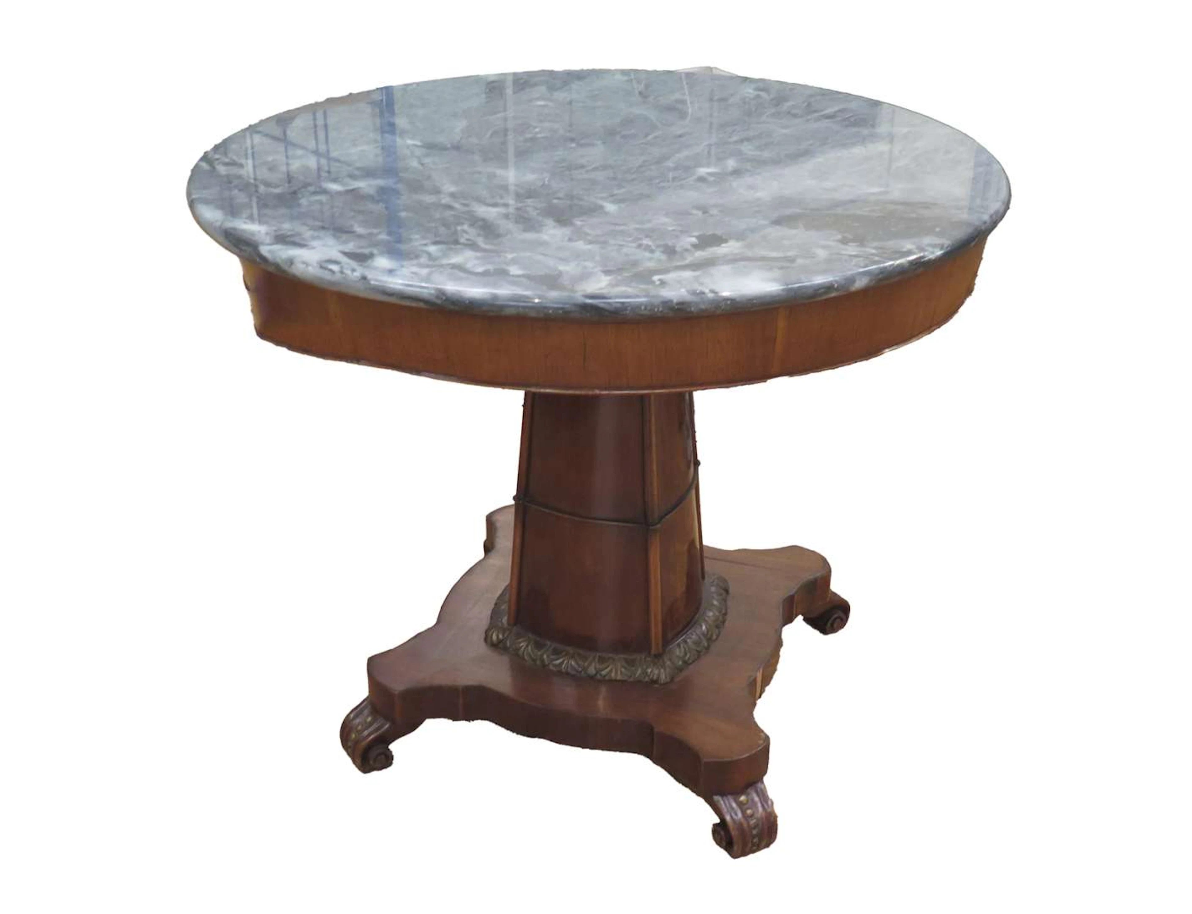 A mahogany coffee table with four chairs and an armchair, Holland, 19th century