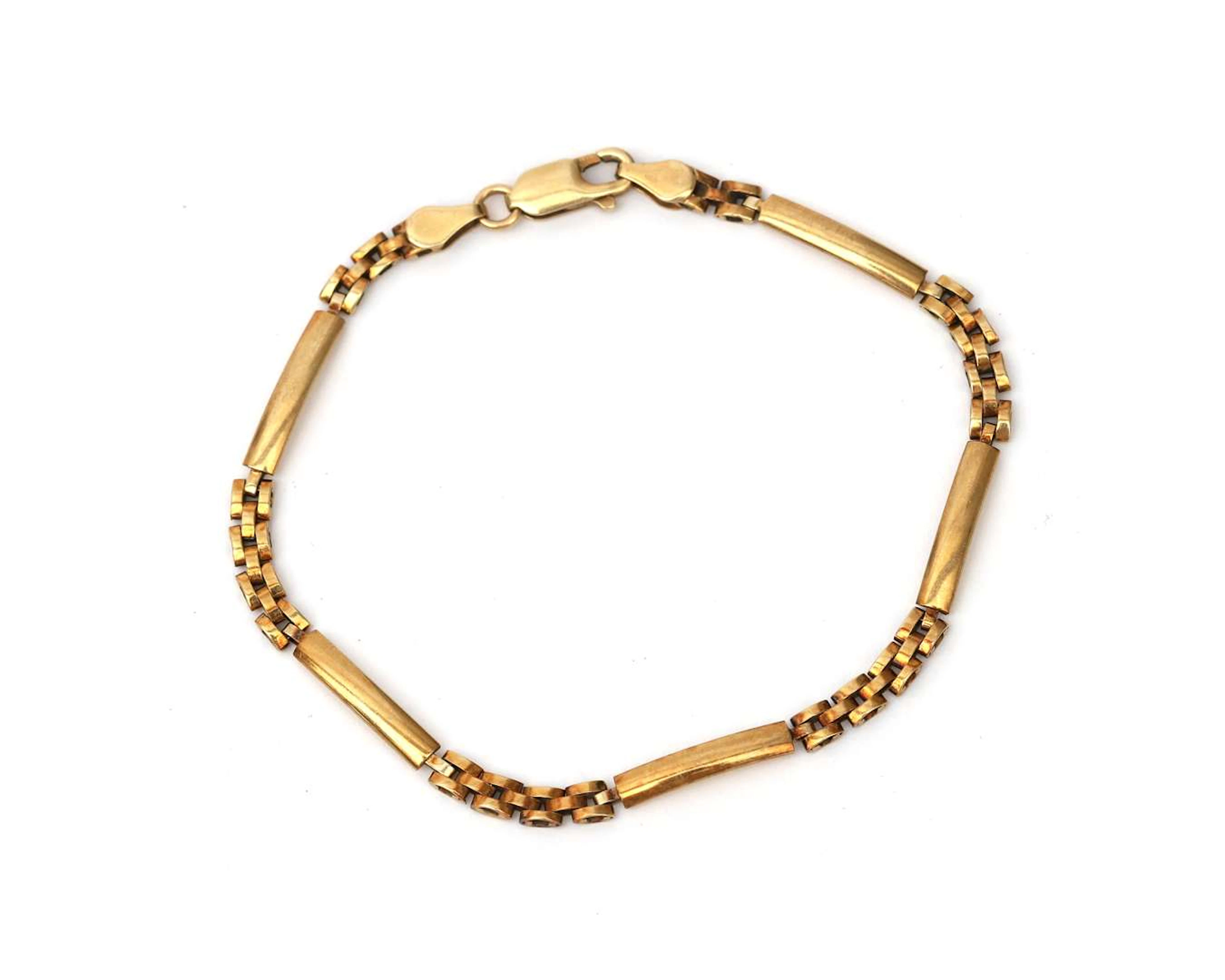 A 14k yellow gold Rolex link bracelet