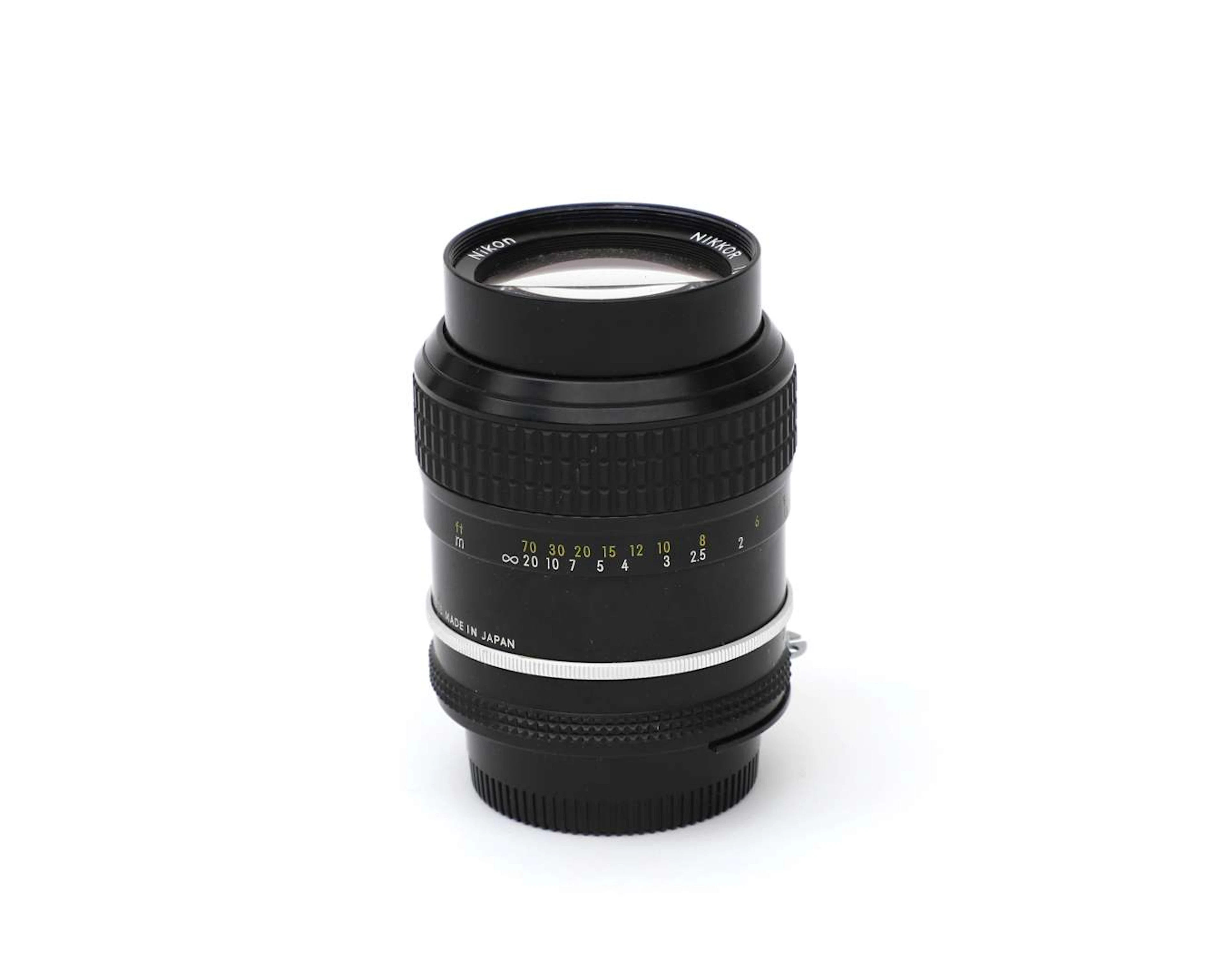 A Nikon Nikkor 1:2.5 F 105 mm lens