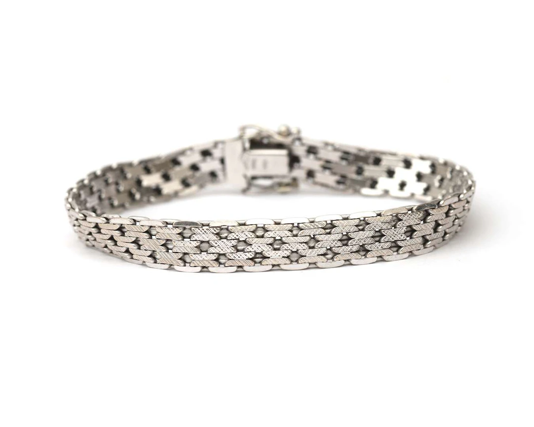 A 14k white gold link bracelet