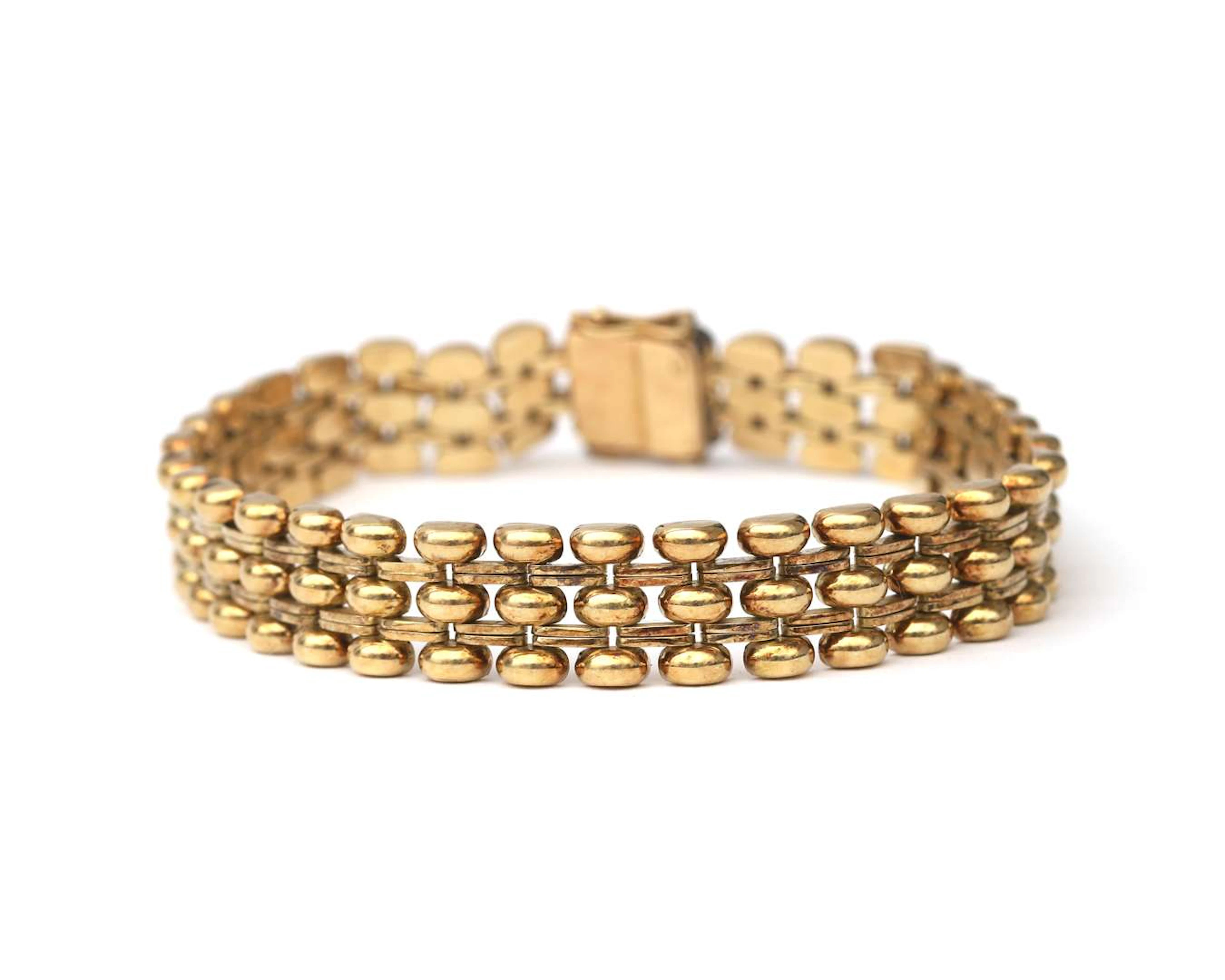 A 14k yellow gold tank-link bracelet