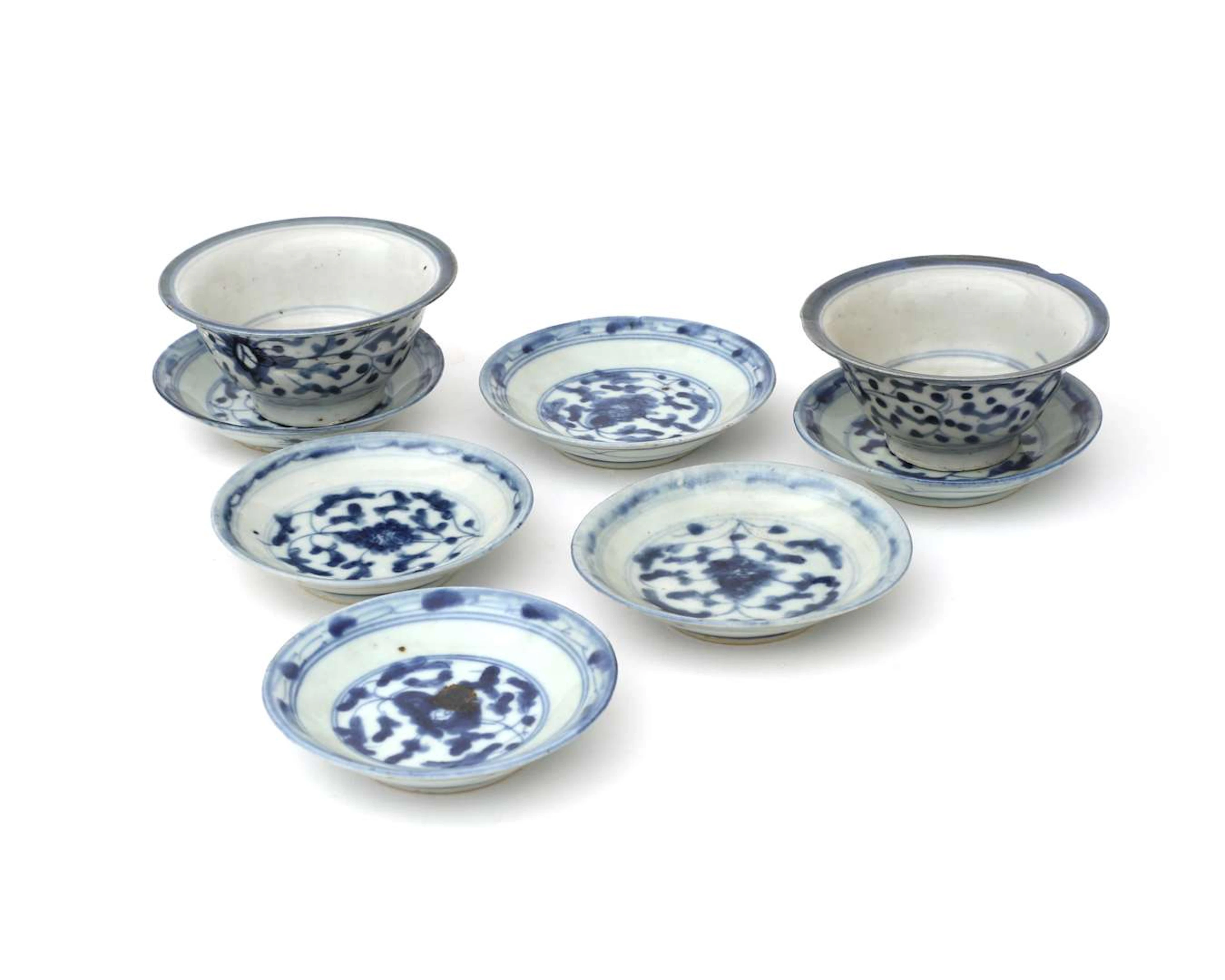 Six blue porcelain saucers and two cups, China, late 18th century