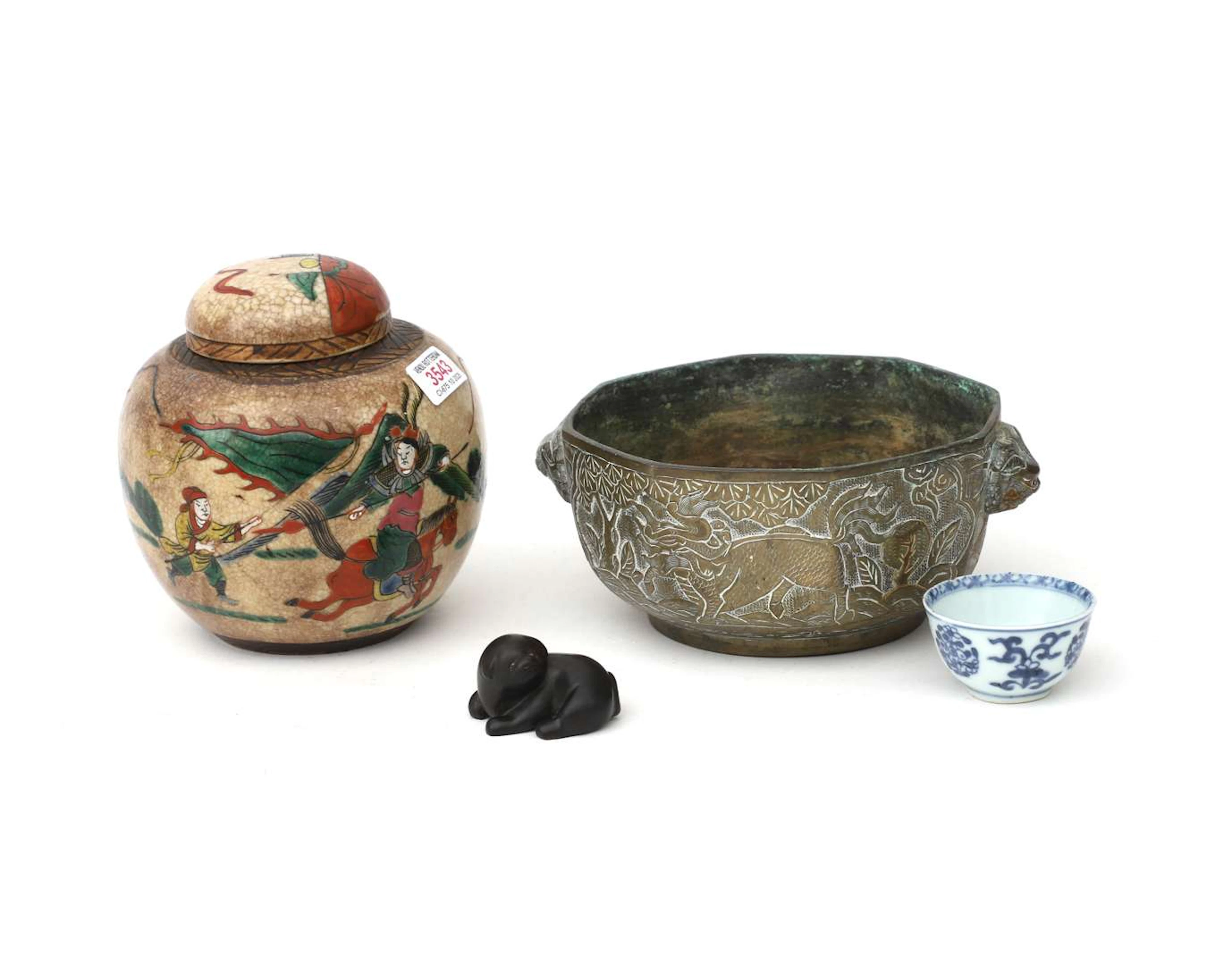 Four assorted Asian items, including a netsuke and a ginger jar, from