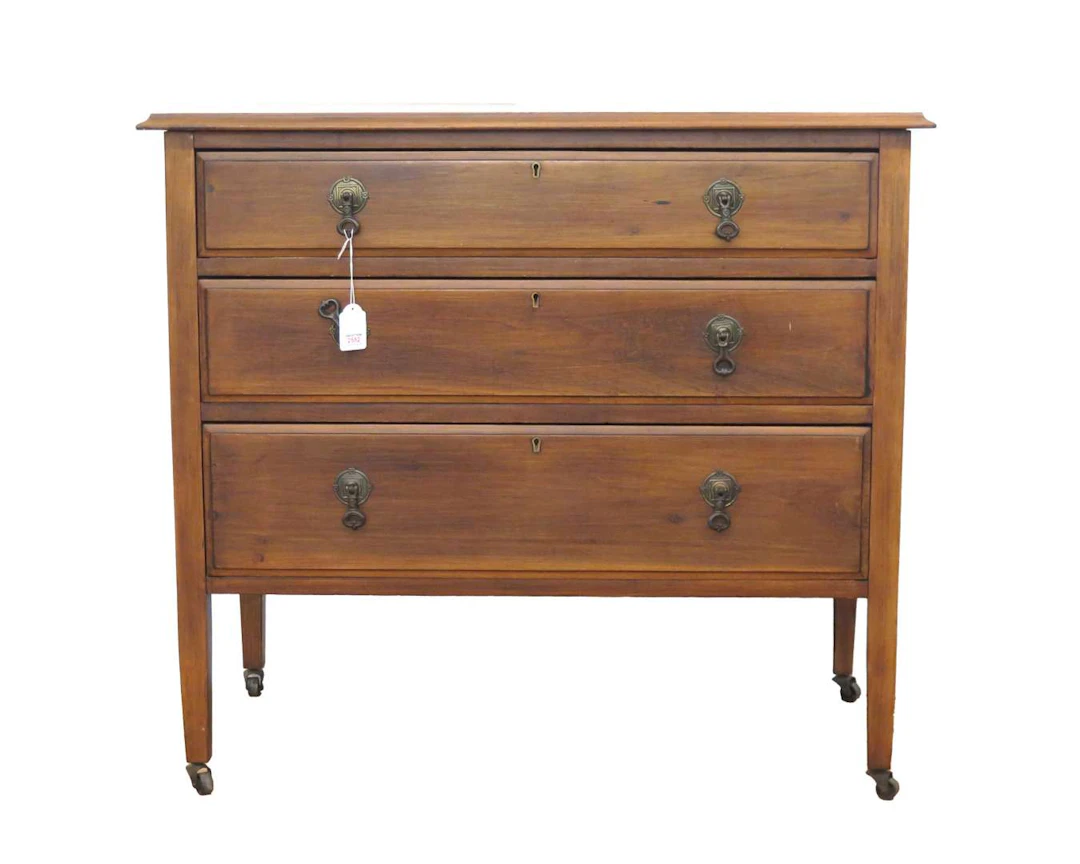 A three-drawer chest of drawers, 20th century