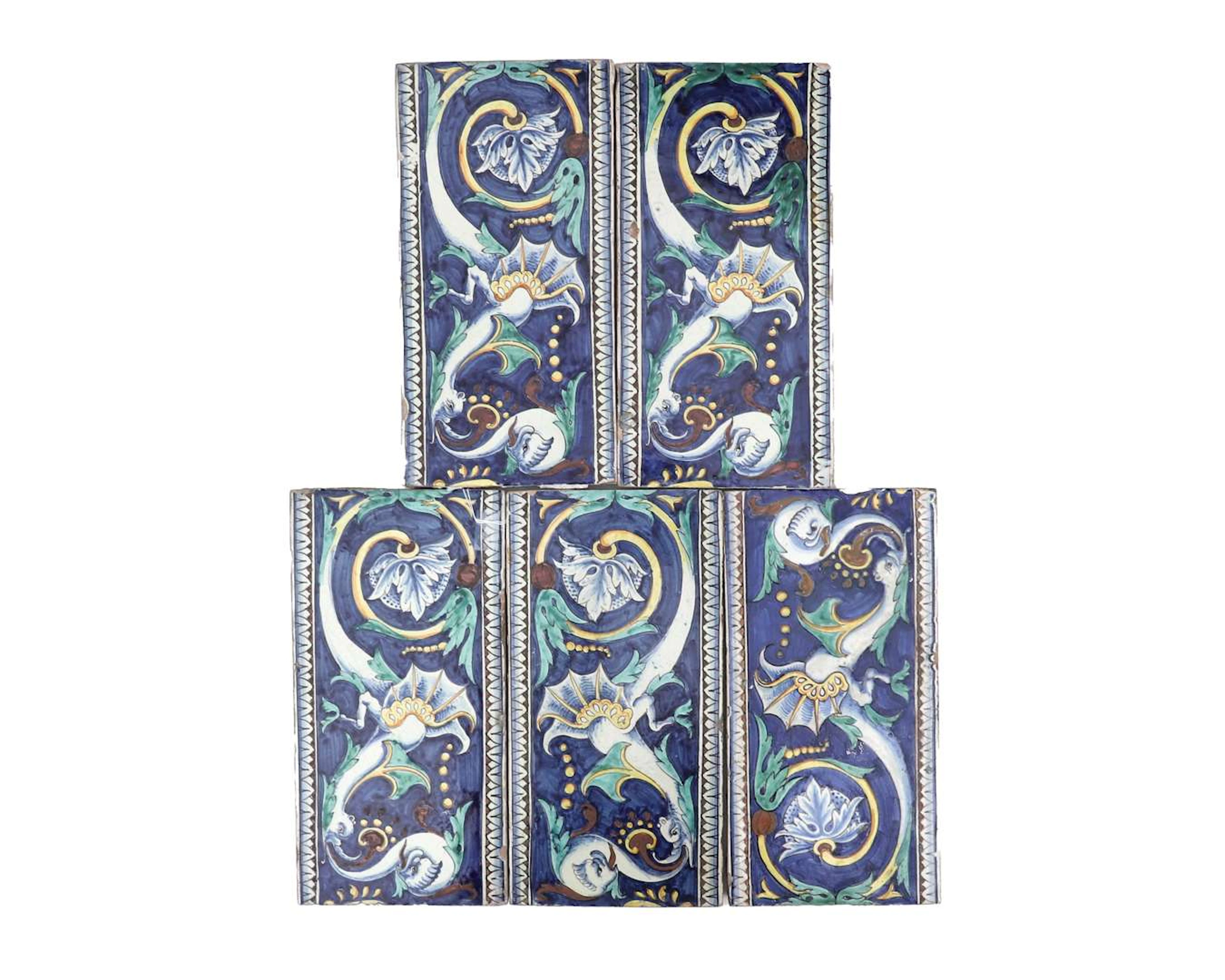 Five coloured earthenware wall tiles. Majolica decoration featuring