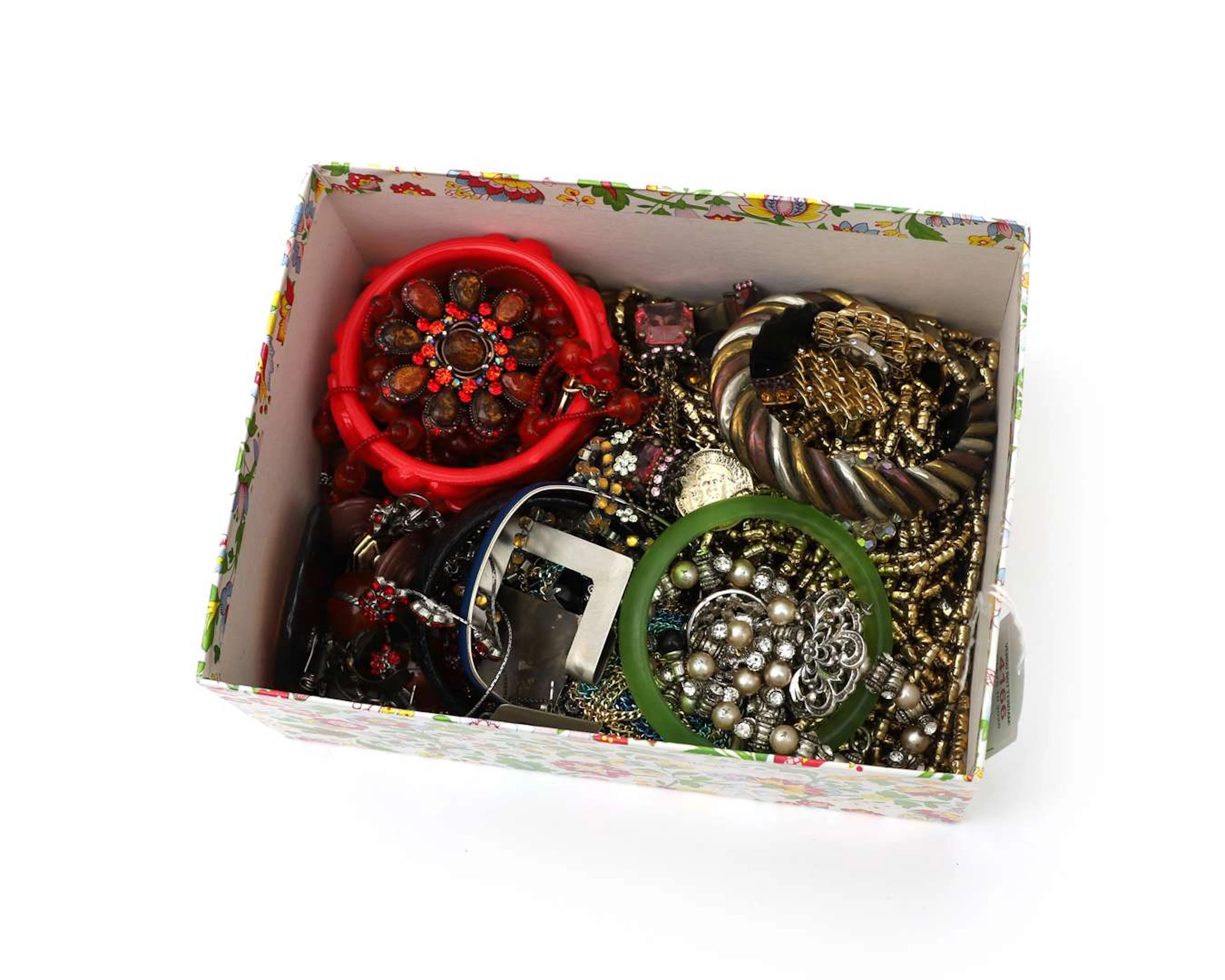 A box containing a variety of costume jewellery