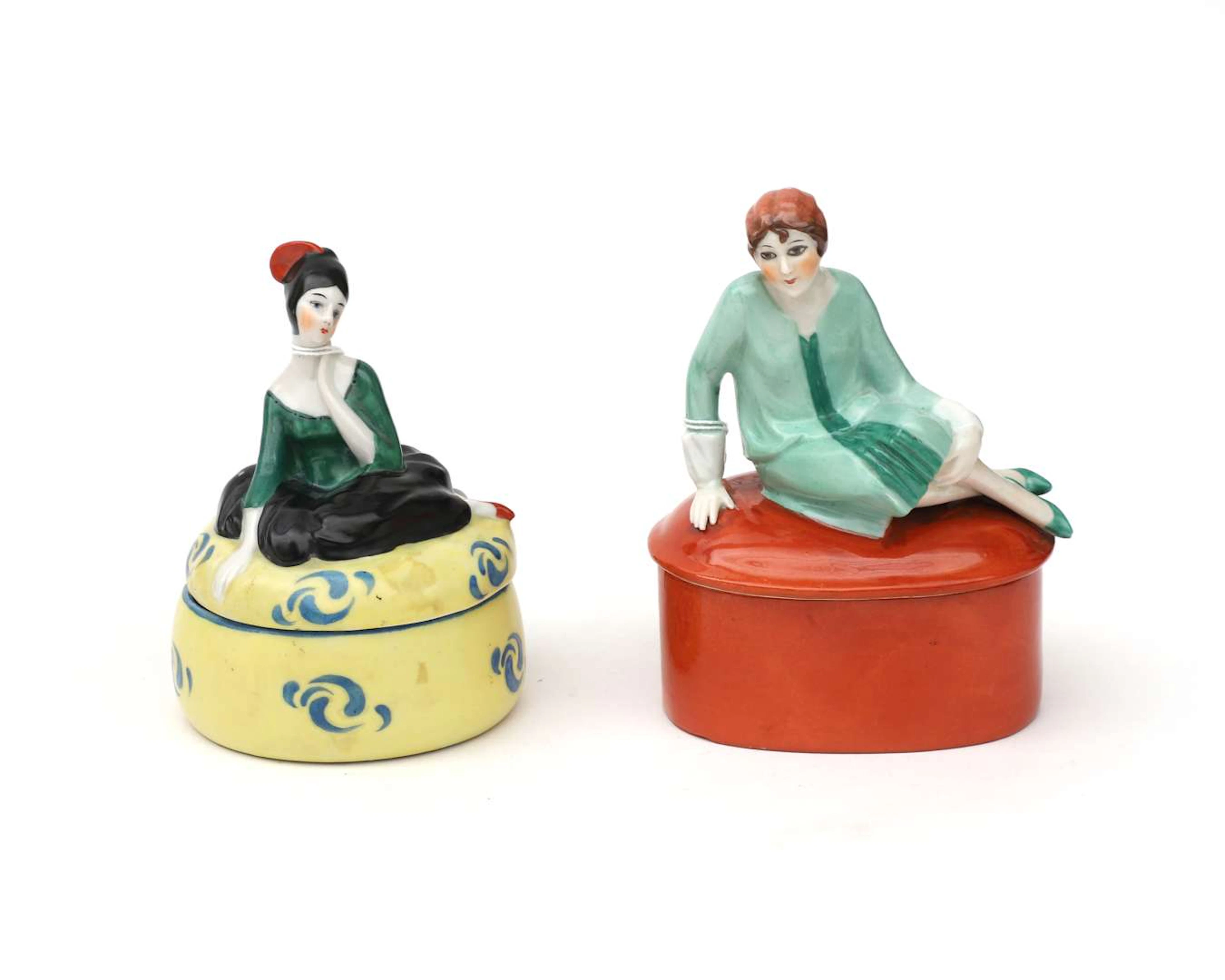 Two porcelain lidded jars depicting women, probably France, 20th century