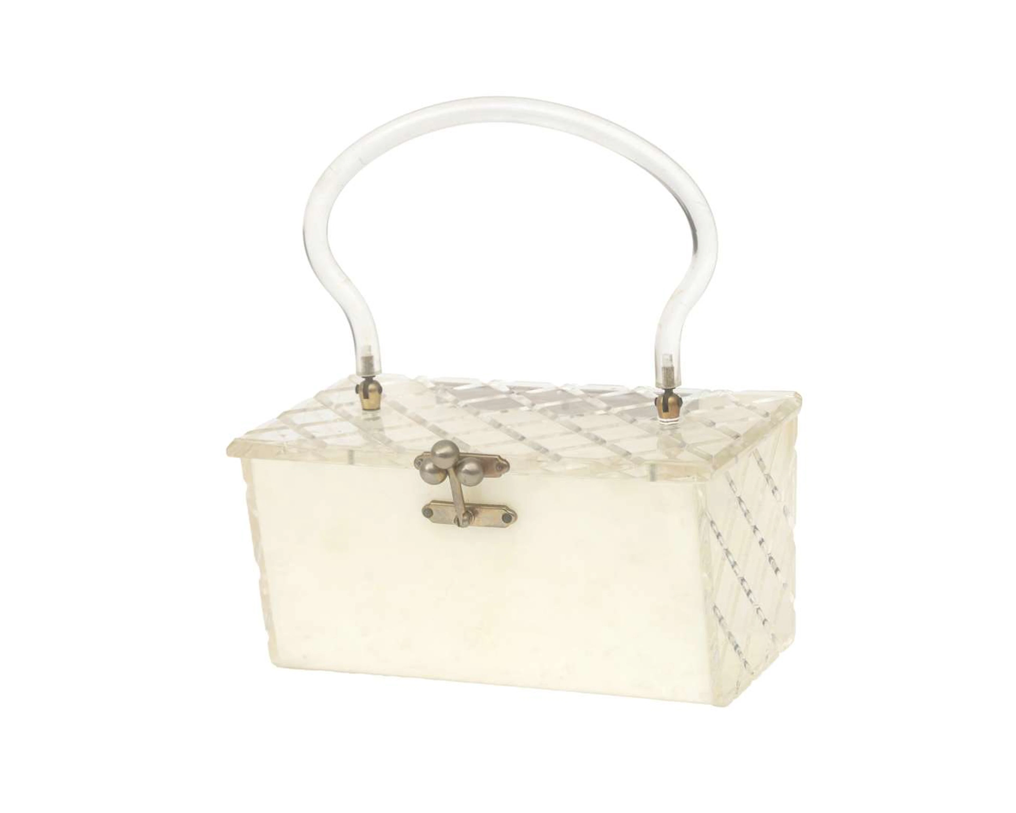 A midcentury lucite handbag/clutch
