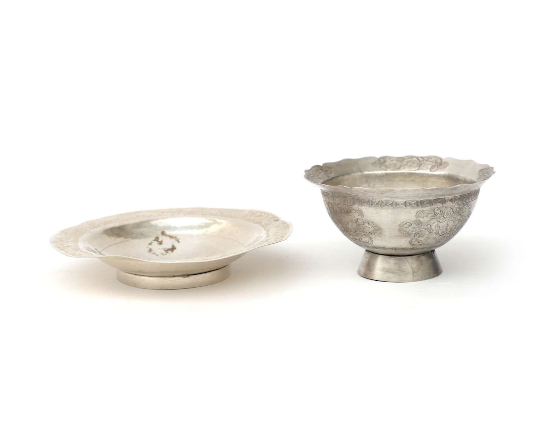 A silver cup and saucer, Asia, 19th/20th century