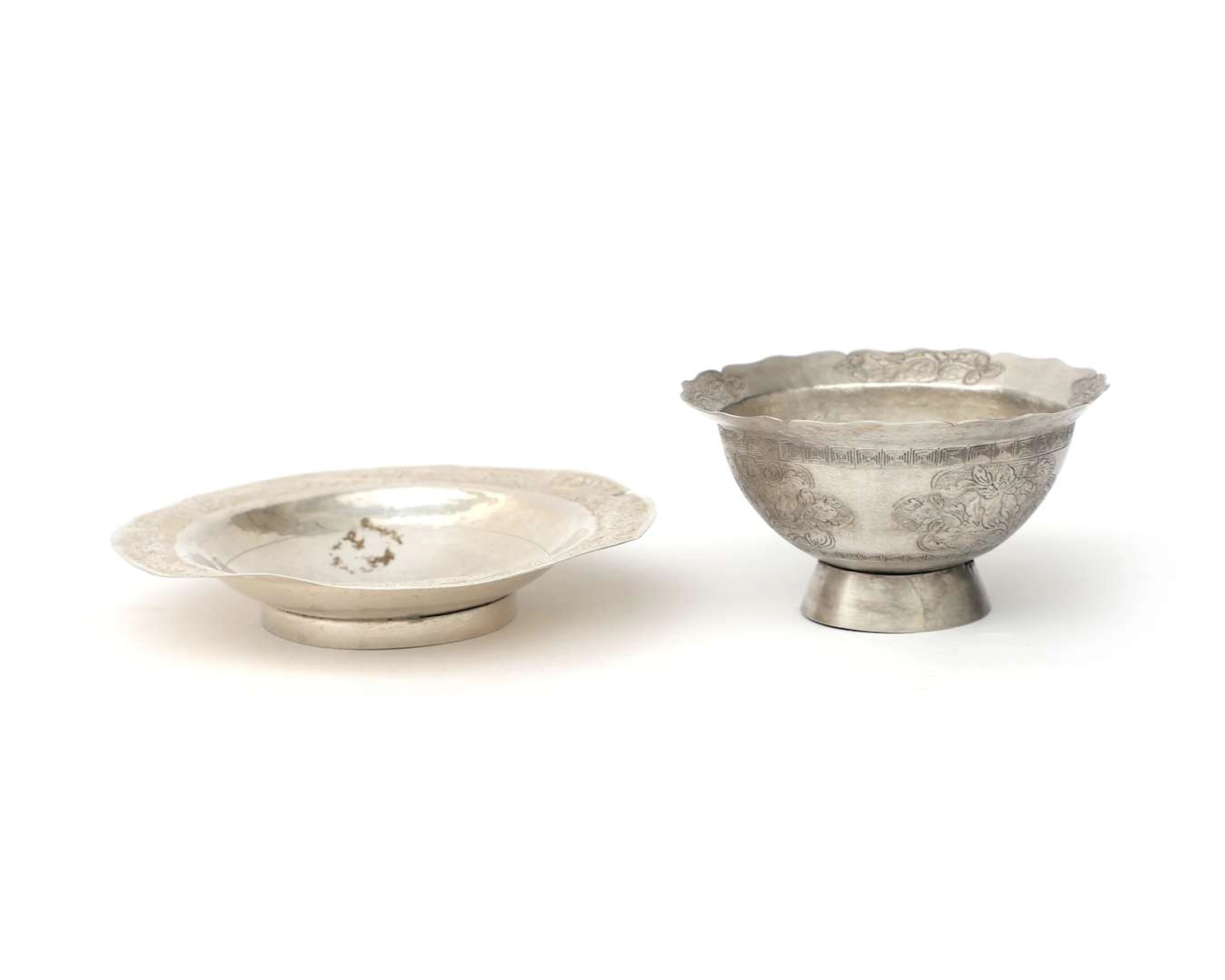 A silver cup and saucer, Asia, 19th/20th century
