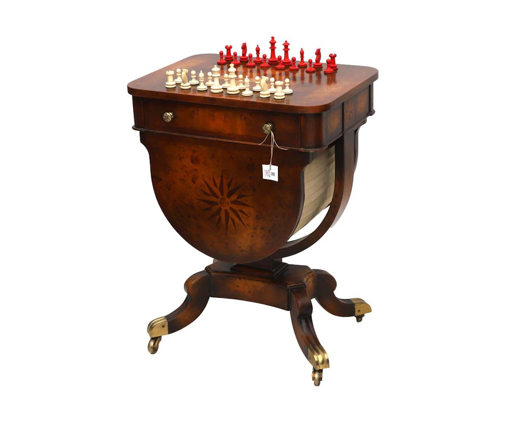 A sewing and chess table with legs in the shape of chess pieces, 20th century