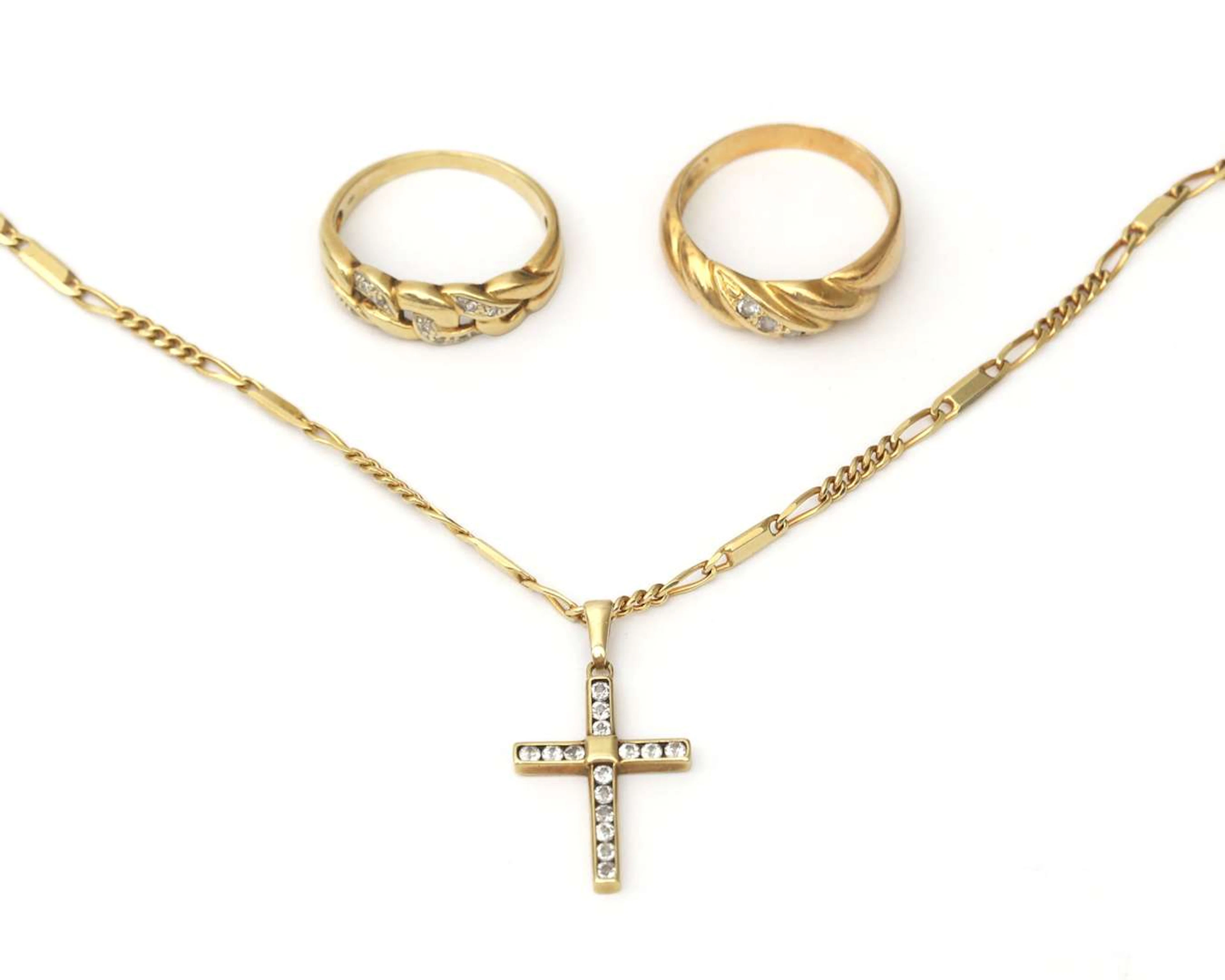 A lot comprising with items of 14k yellow gold jewellery, including