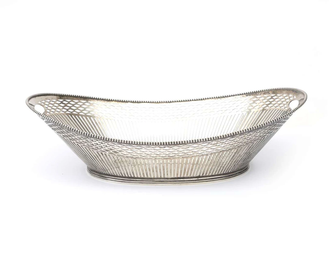 A silver bread basket, the Netherlands, Voorschoten, 1944