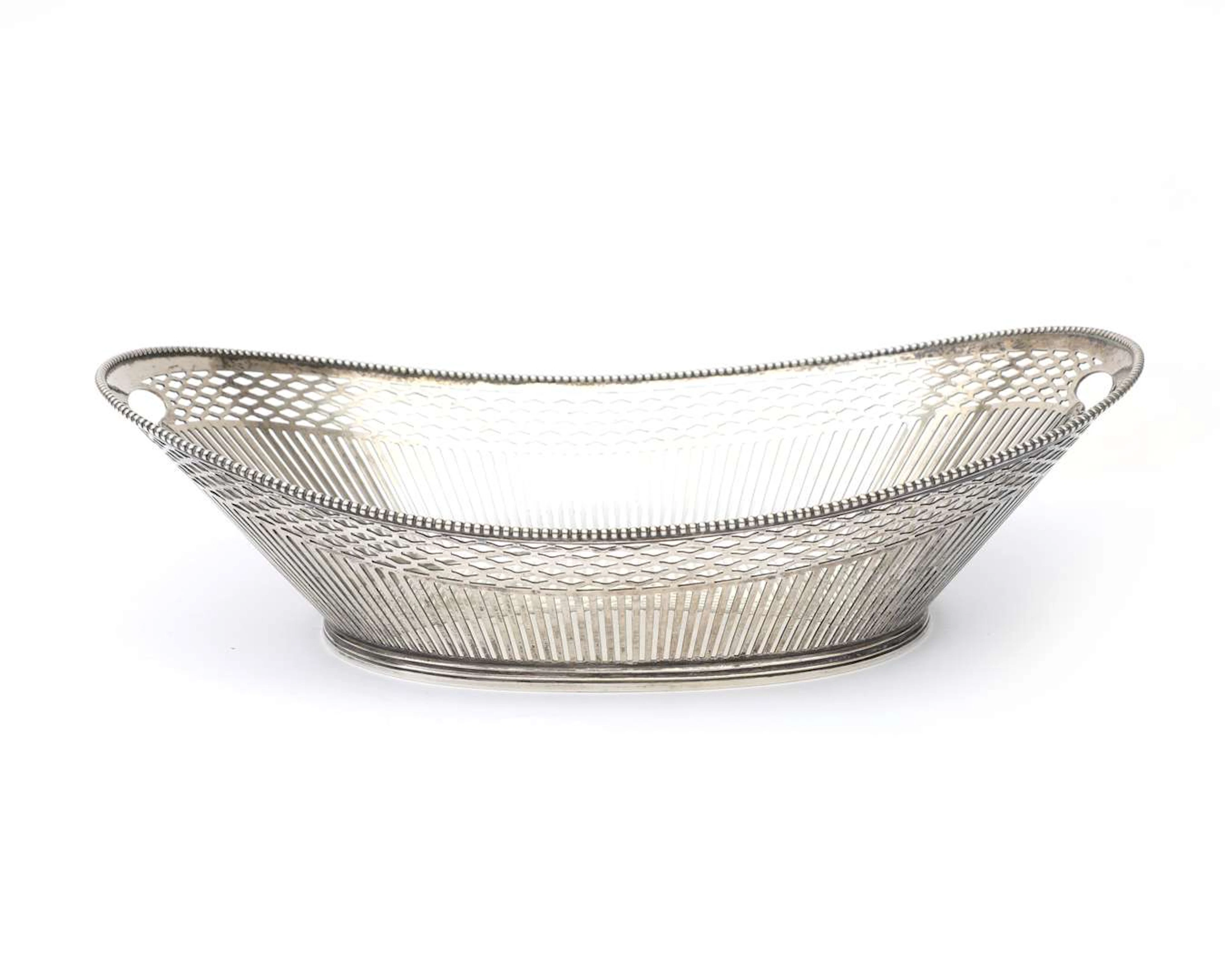 A silver bread basket, the Netherlands, Voorschoten, 1944