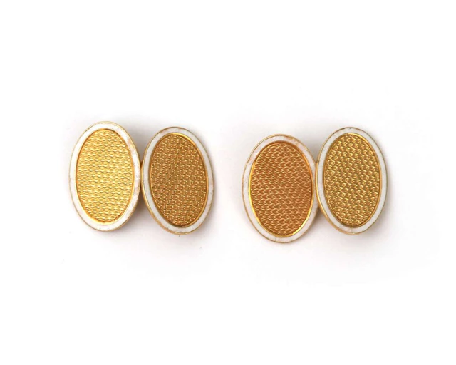 A pair of 18k yellow gold cufflinks with white enamel, 1920s