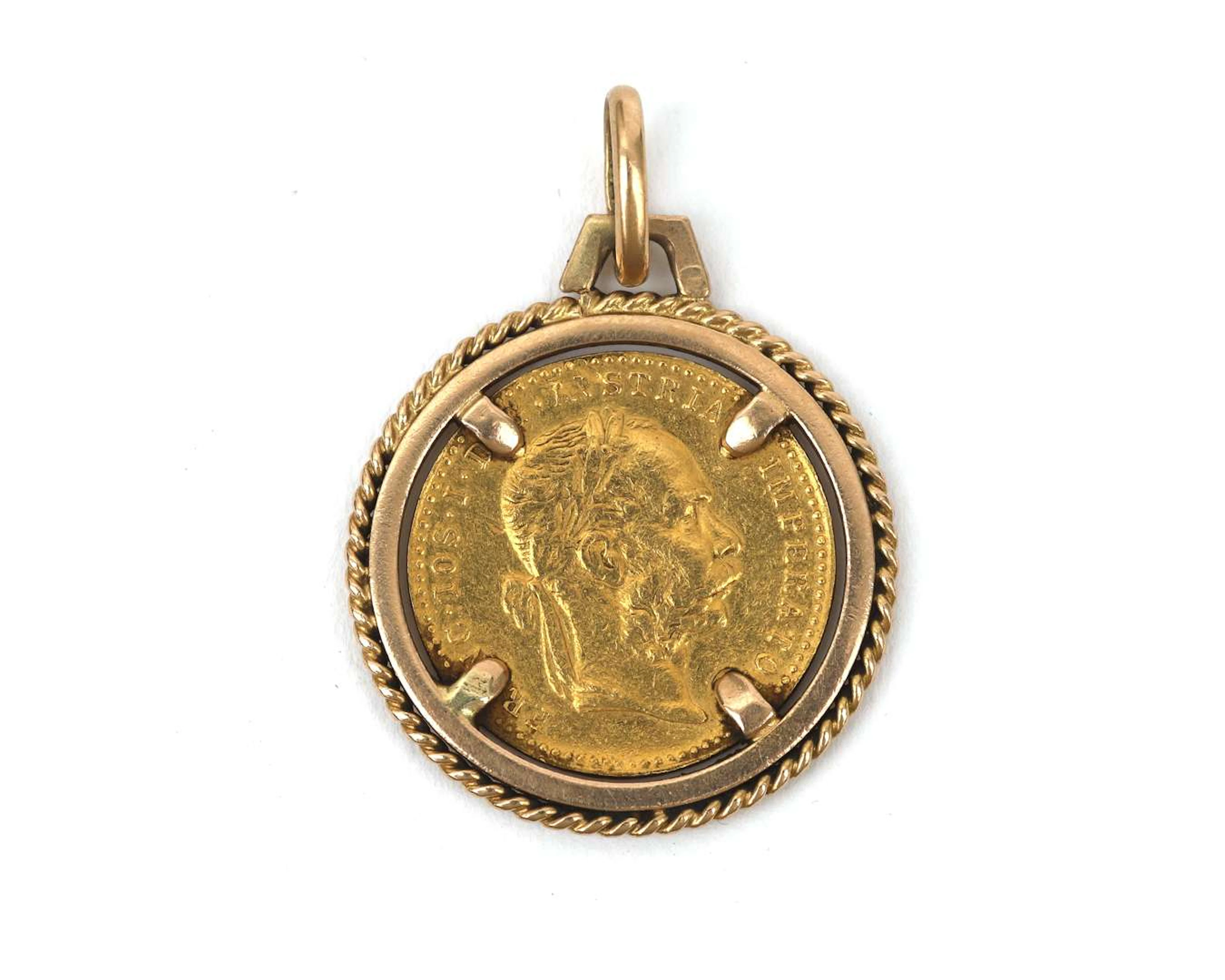 A golden coin, ducat in golden mount, emperor Franz Joseph I, Austria, 1915