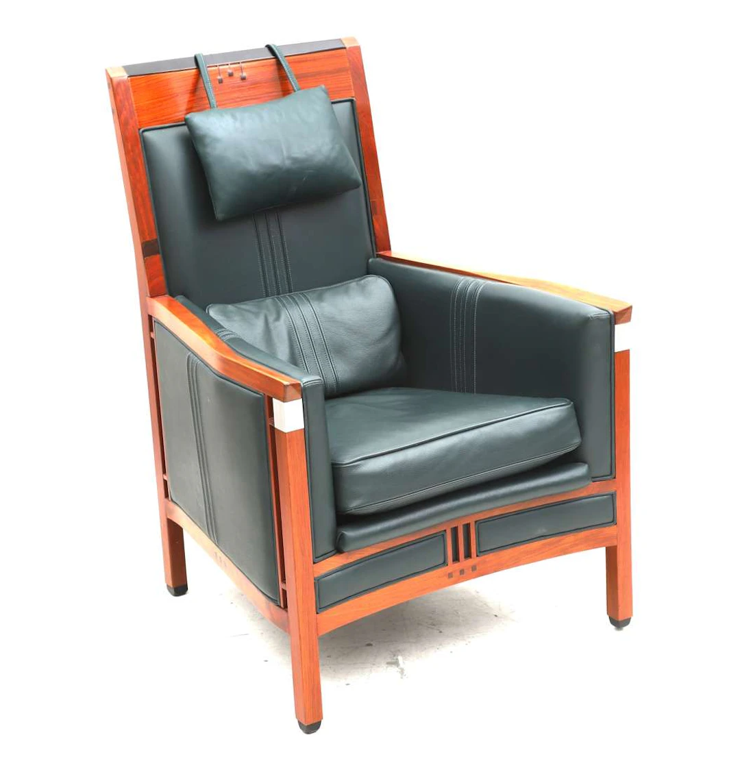 An Art Deco-style armchair made of bubinga wood. Schuitema Decoforma