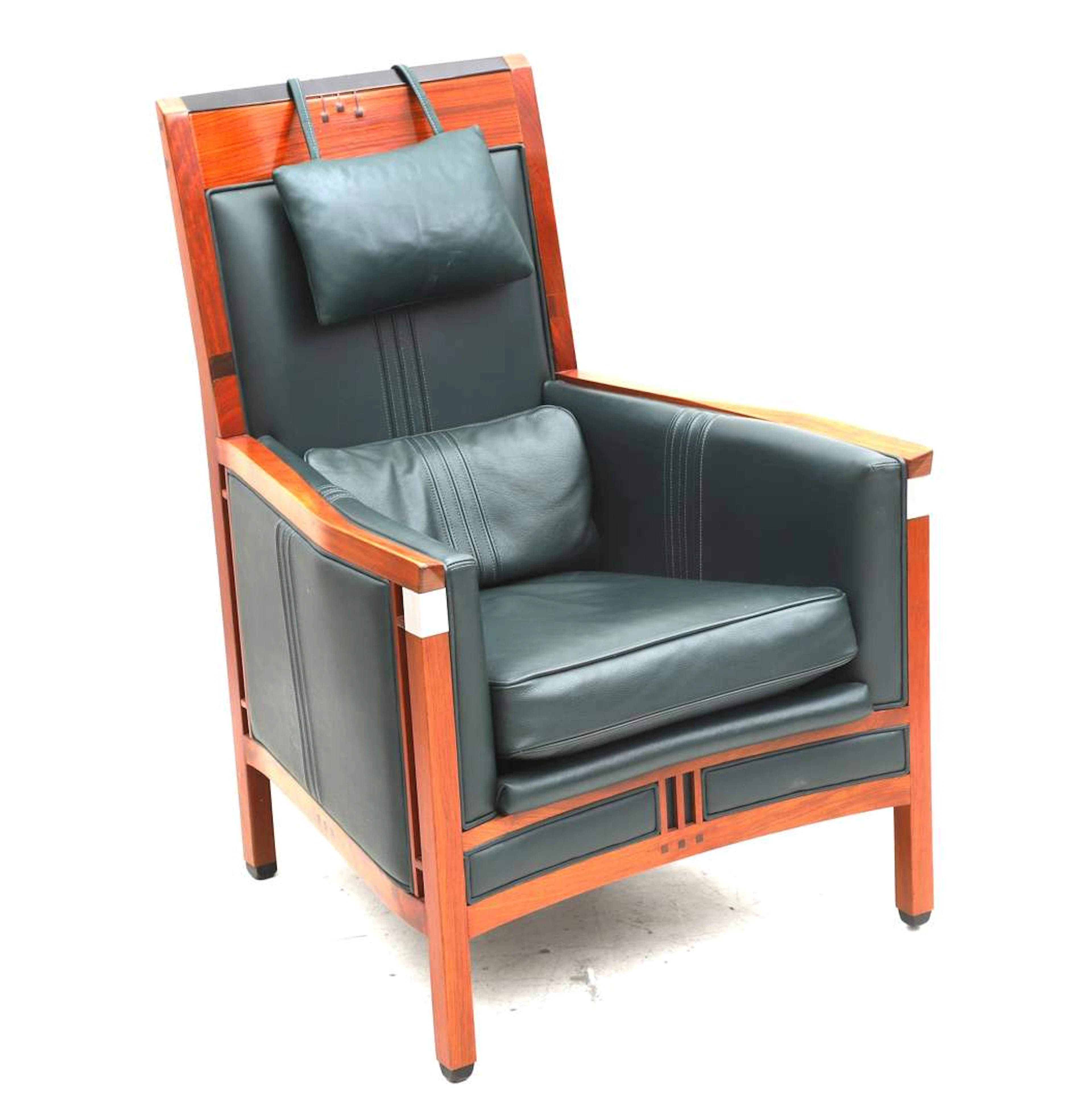 An Art Deco-style armchair made of bubinga wood. Schuitema Decoforma