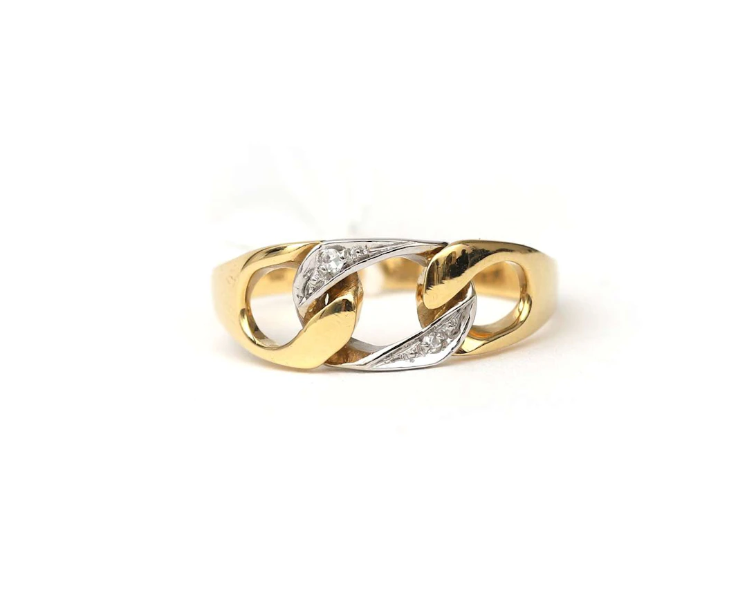 An 18k bicolour gold ring with diamonds