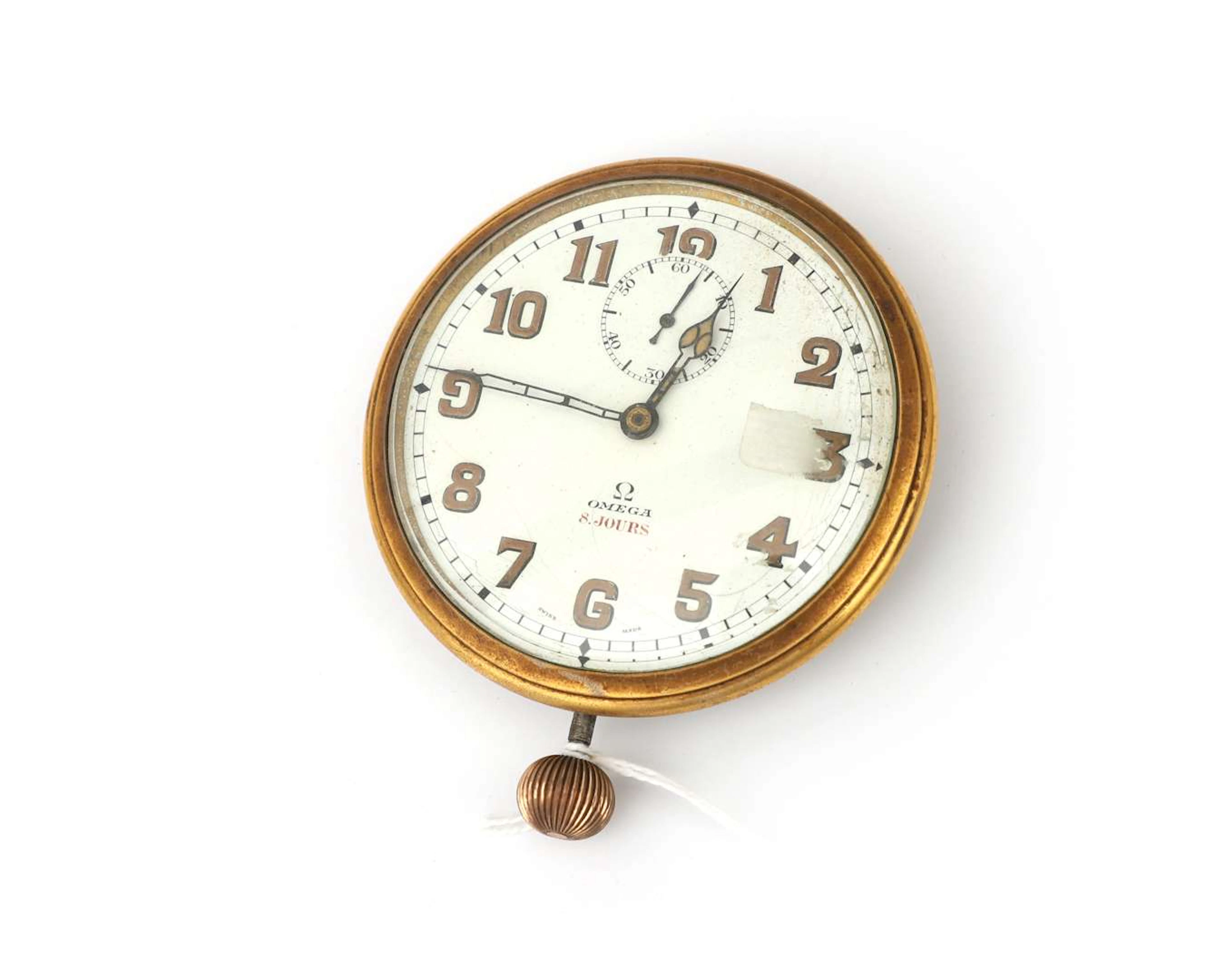 A brass Omega car clock