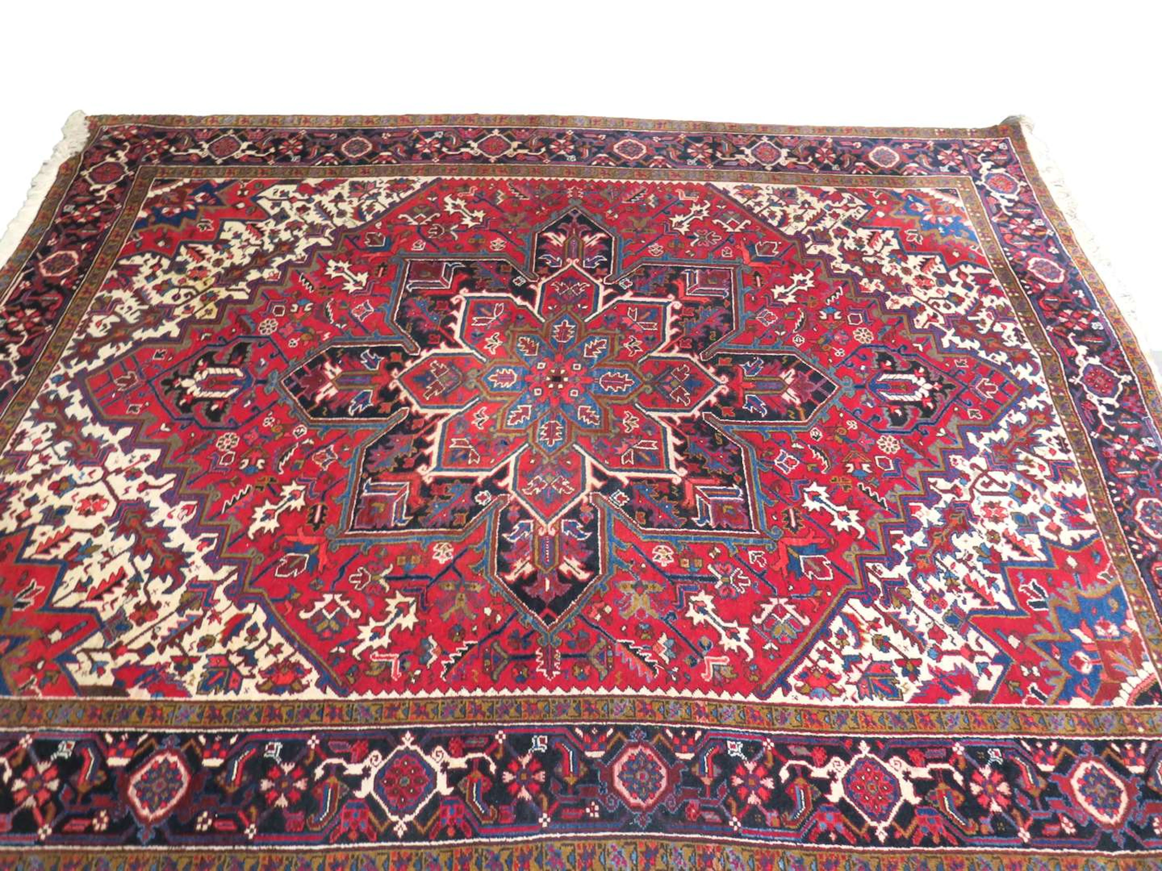 A carpet, Iran, 20th century, dimensions 322 x 252 cm.