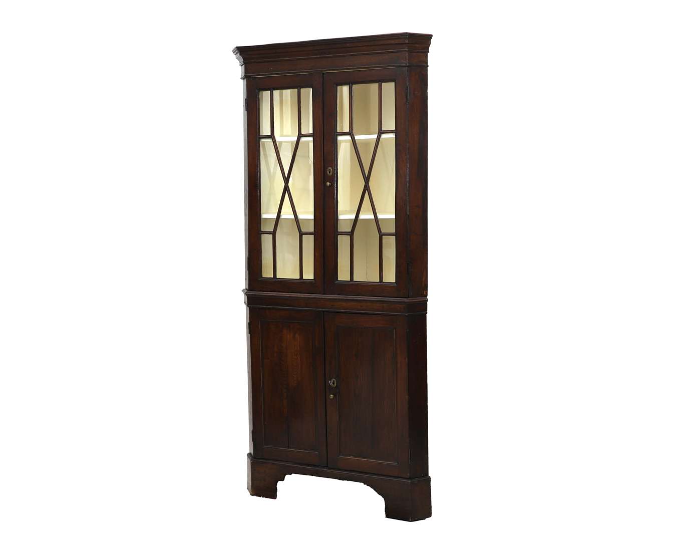 An oak corner cupboard. England, 18th century