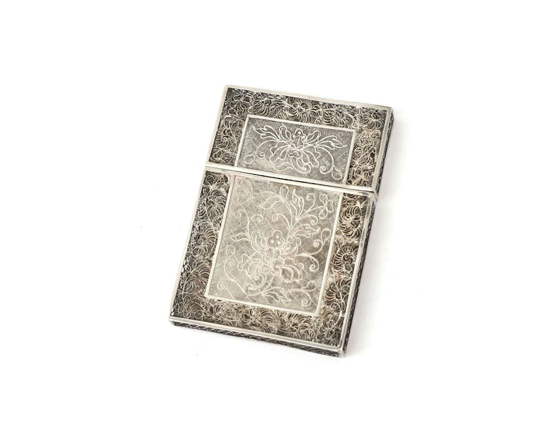A silver business-card holder, probably from Asia, 20th century