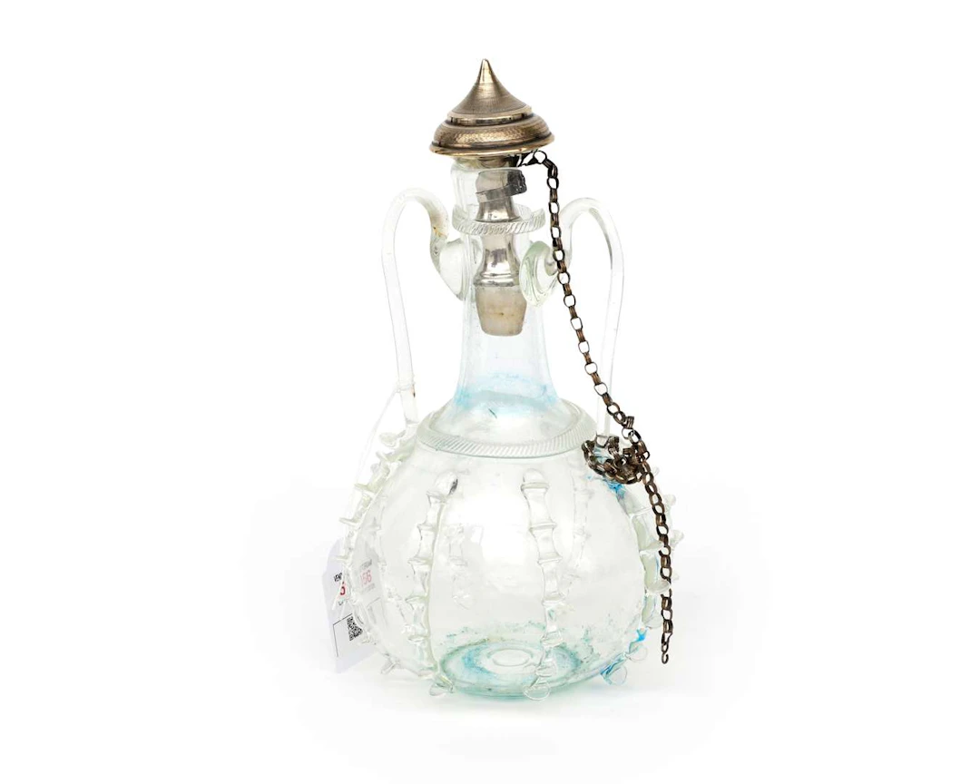 A glass wedding bottle with a sterling silver stopper, Netherlands, c. 1900