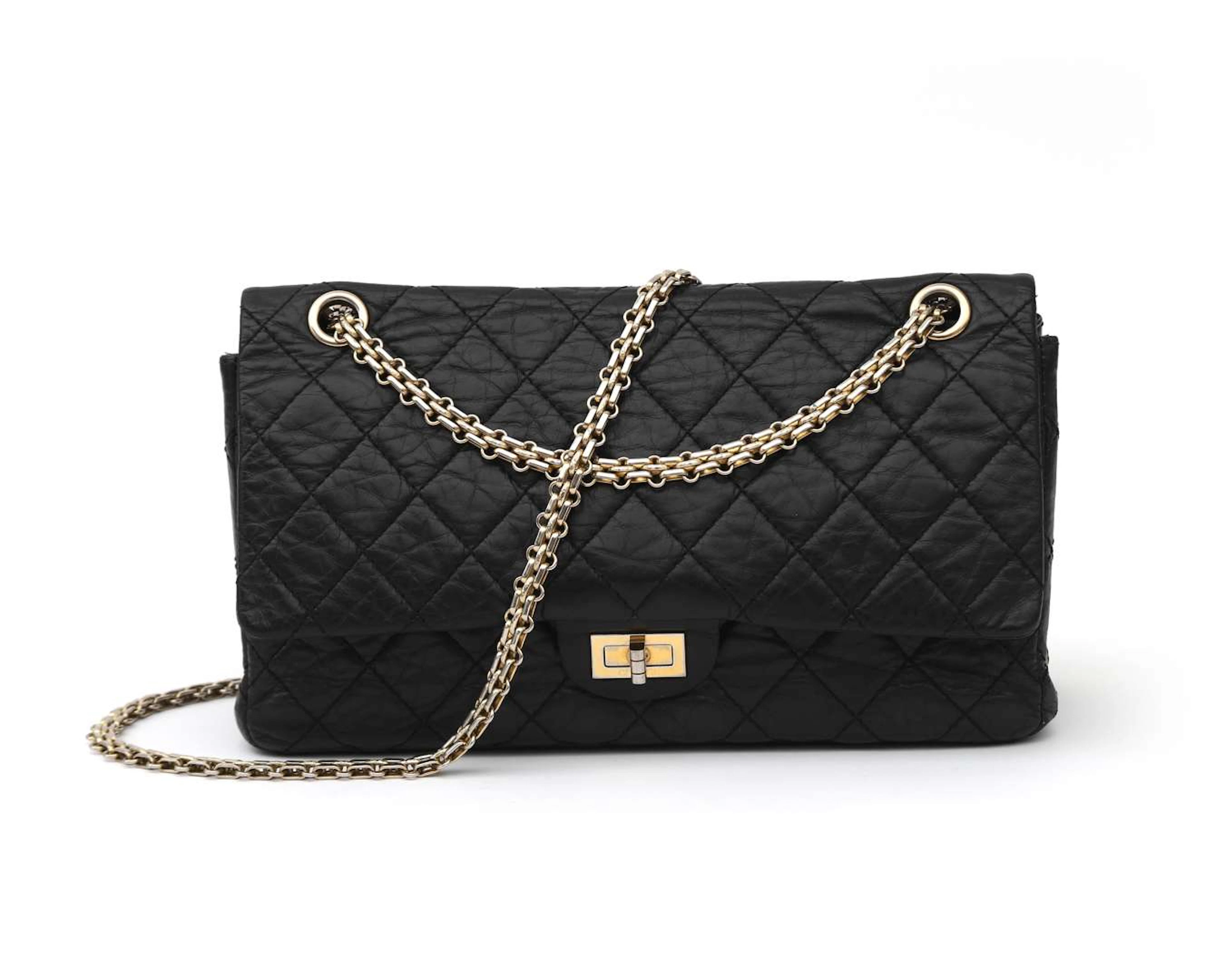A black calf leather Chanel 2.55 handbag