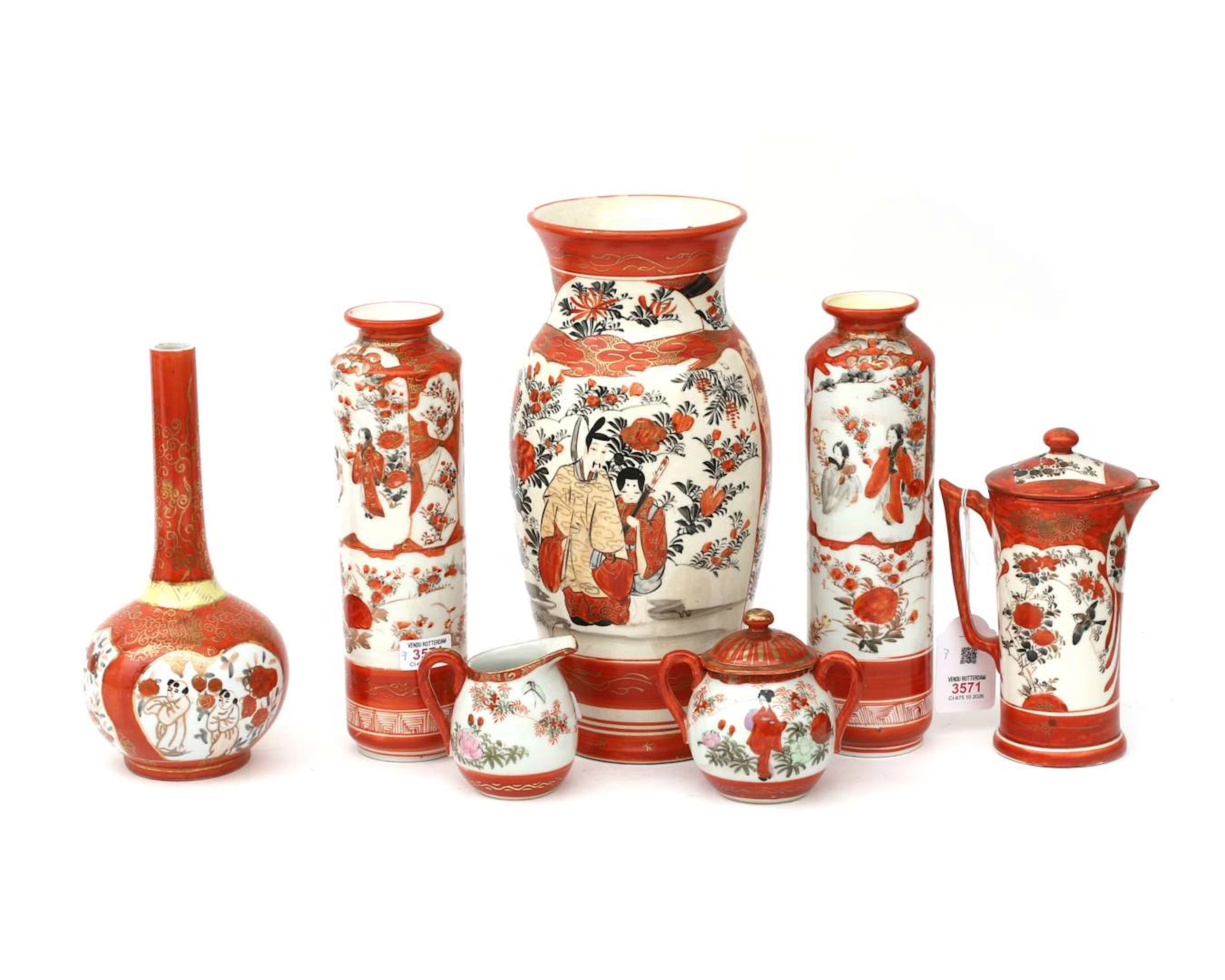 Seven pieces of coloured Japanese porcelain, including vases and a