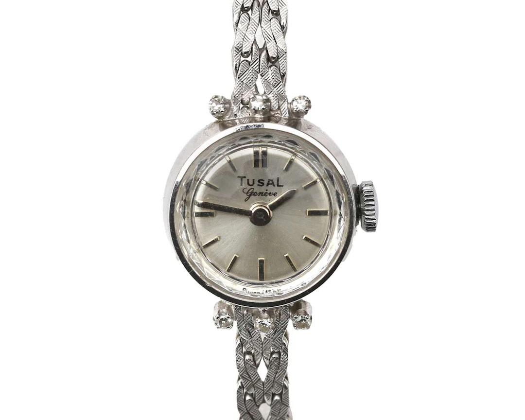 A 14k white gold Tusal ladies' wristwatch