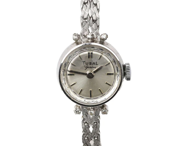 A 14k white gold Tusal ladies' wristwatch