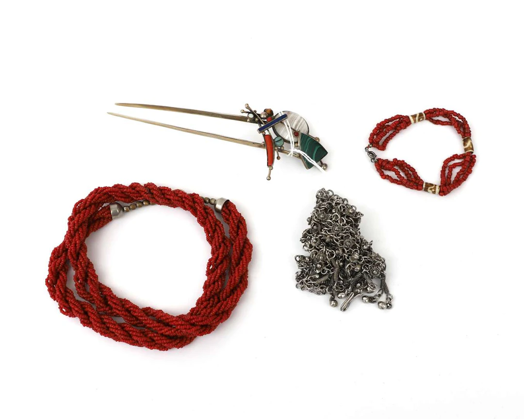 Two necklaces, a bracelet and a hairpin