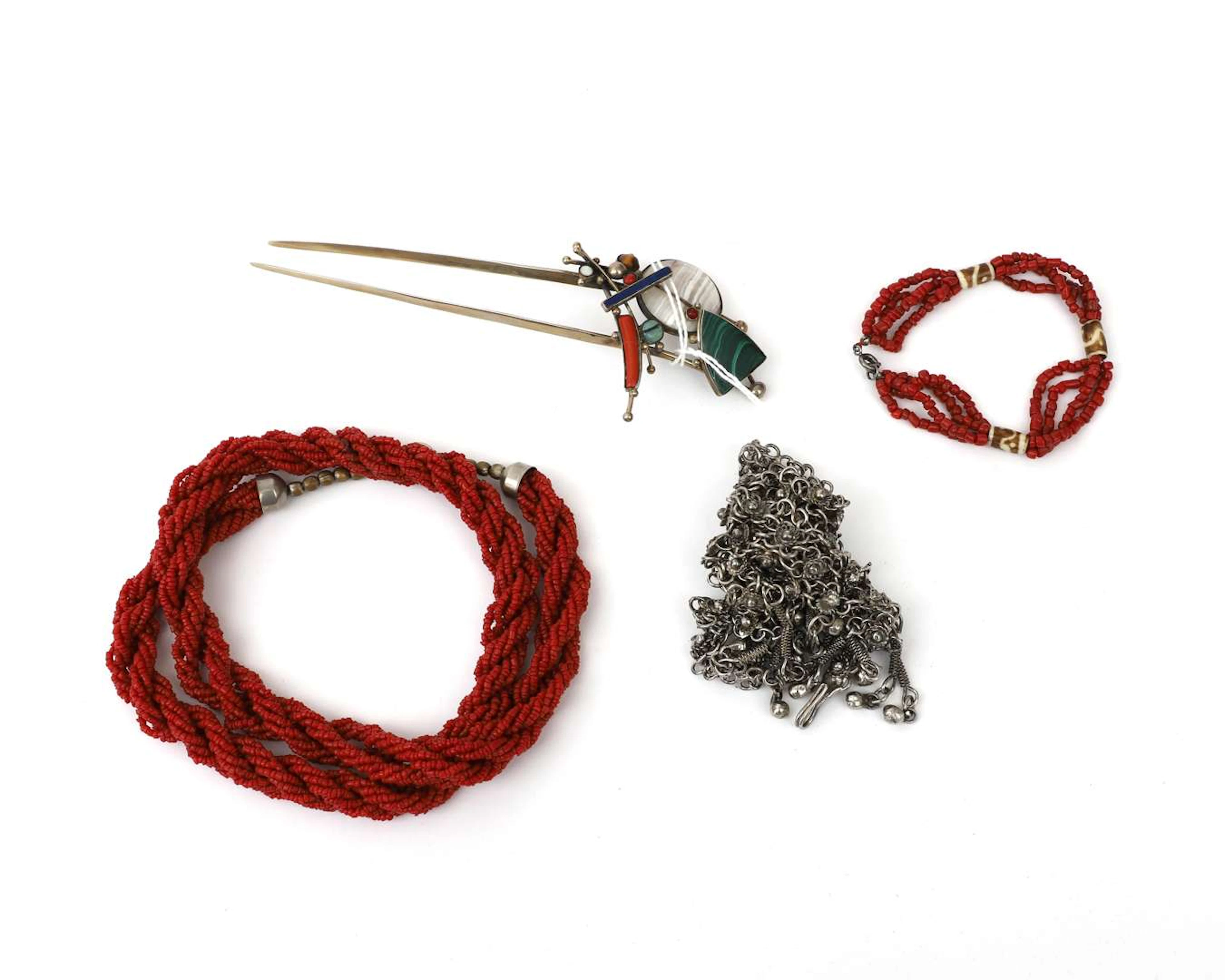 Two necklaces, a bracelet and a hairpin