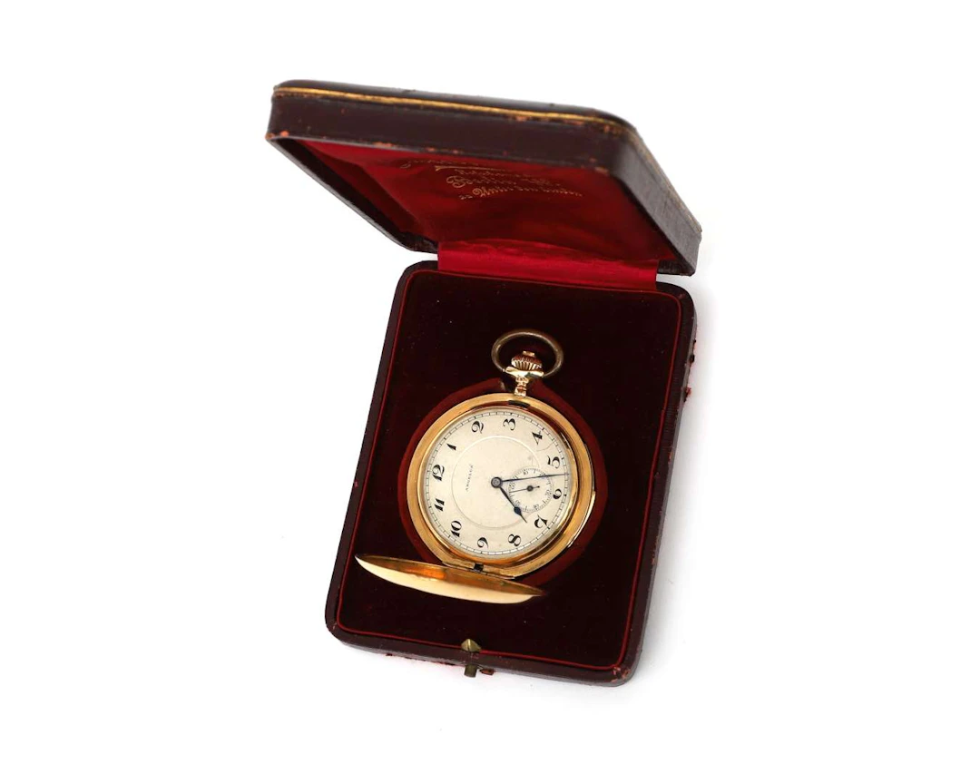 An 18k yellow gold minute repeater pocket watch by Angelus