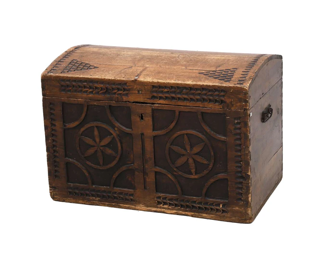 A blanket chest with embroidered star motifs, 20th century