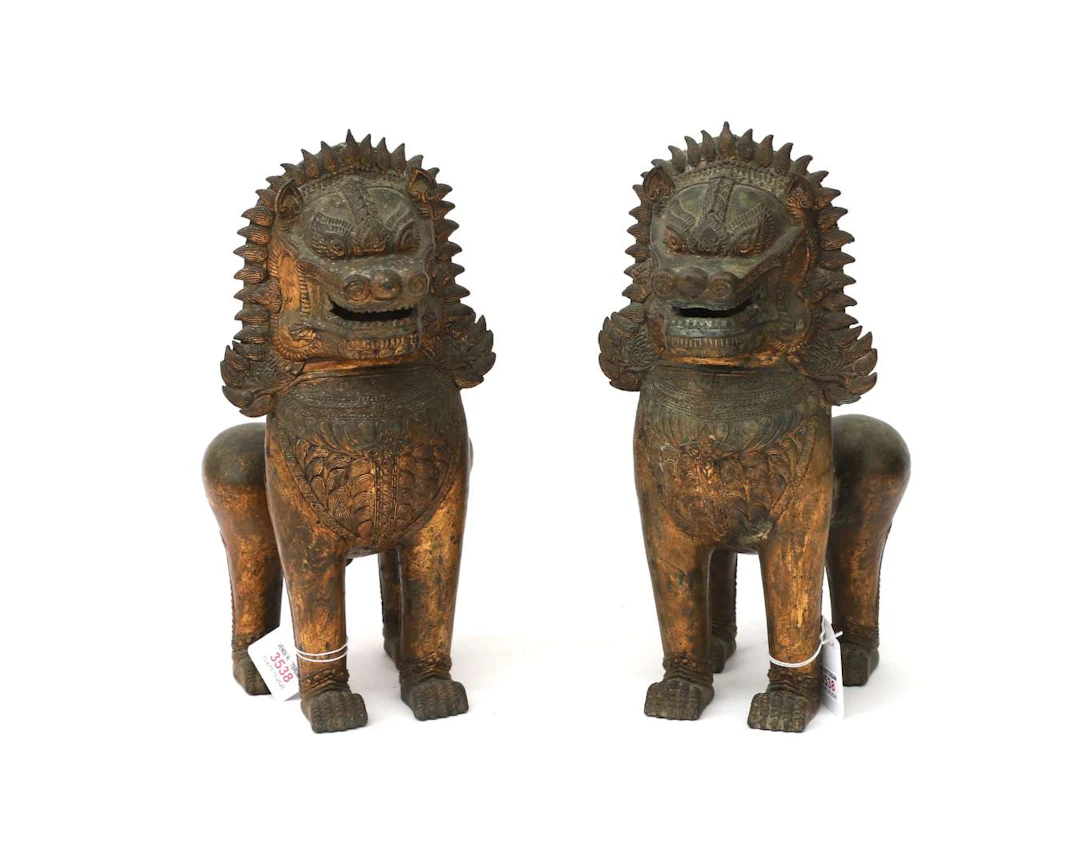 Two gilded bronze Singha temple lions, Thailand, first half of the 20th century