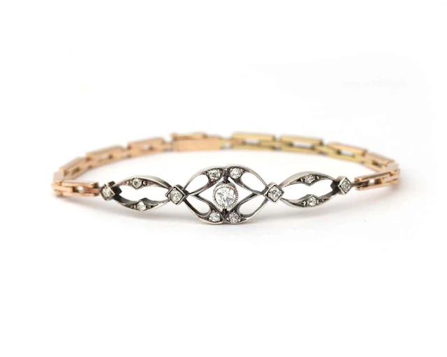 A 14-carat rose gold [rosegouden] Belle Époque bracelet with silver