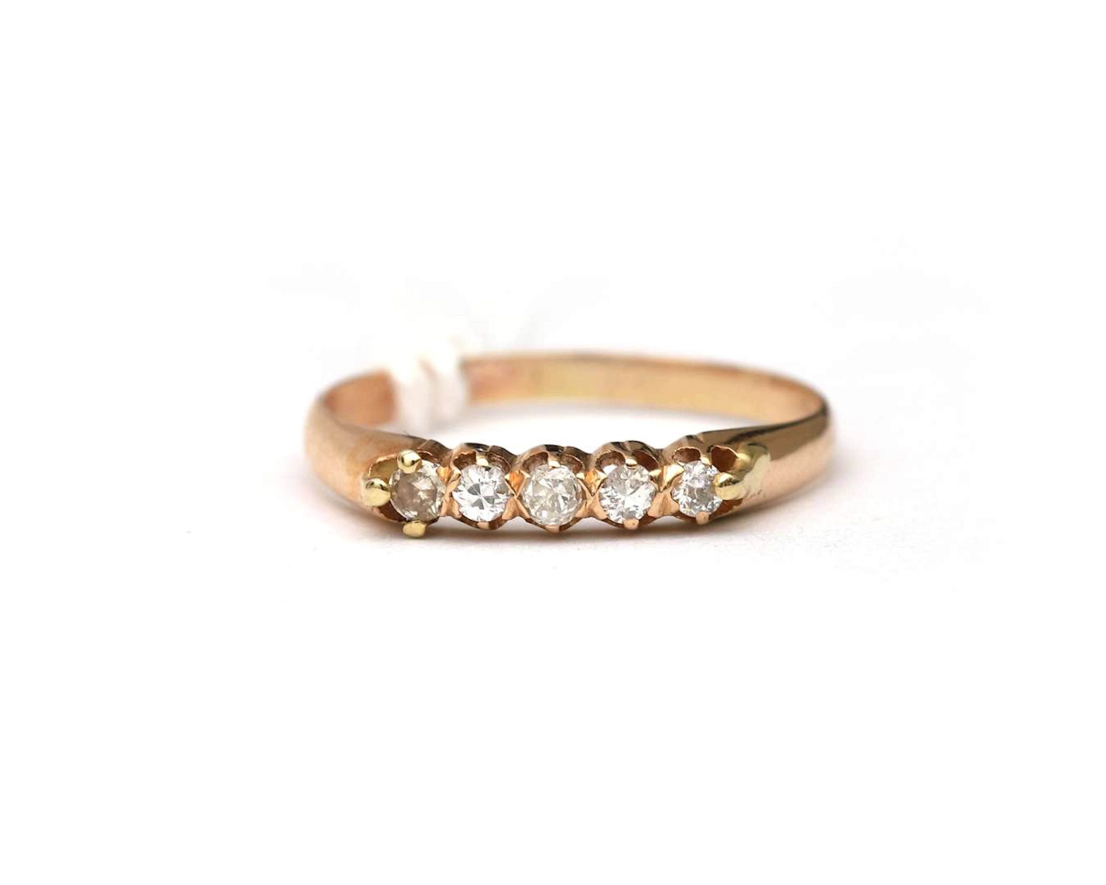 A 14k yellow gold ring with diamonds