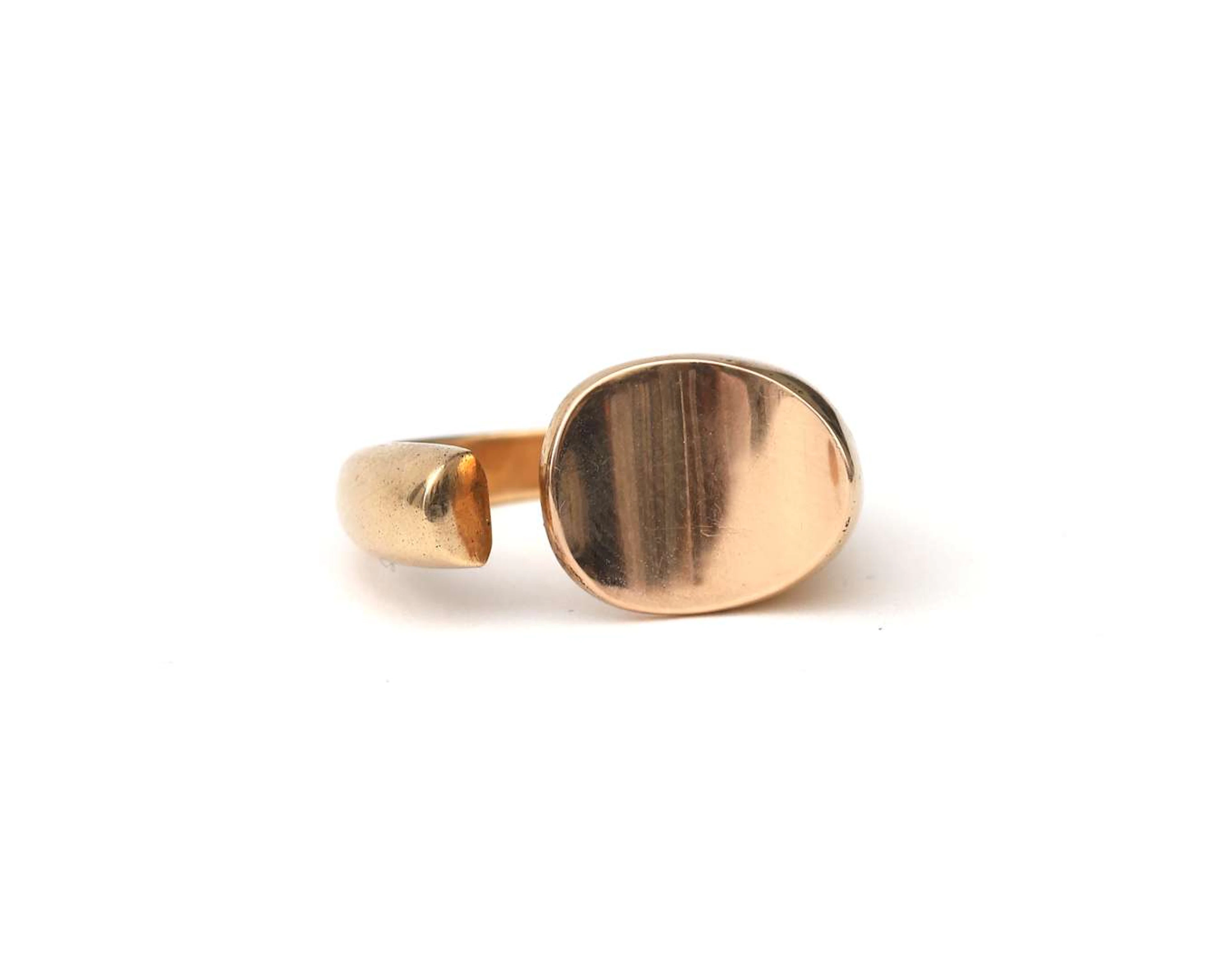 A 14-carat rose gold ring by Ton Postma