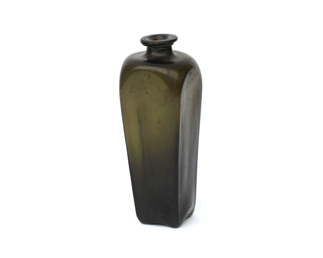 A glass cellar or jenever bottle, Holland, c. 1800