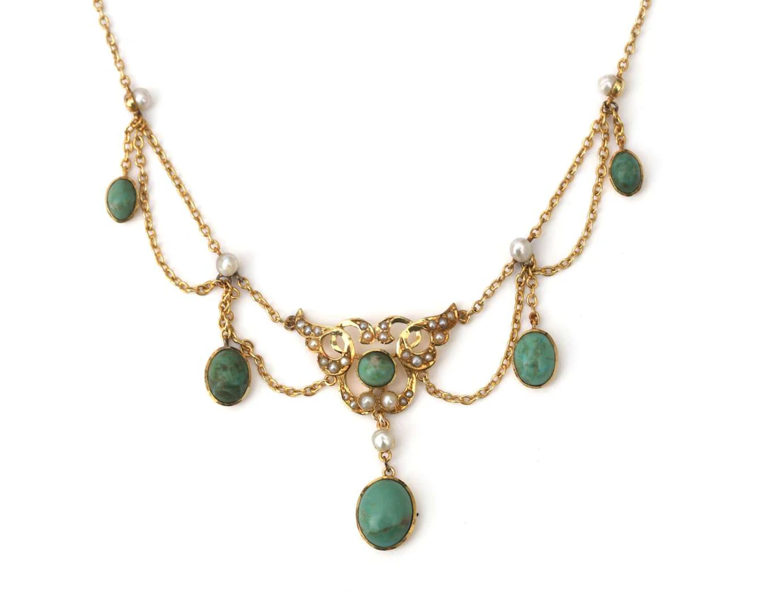 A 14k yellow gold Edwardian lavalière necklace with turquoise and