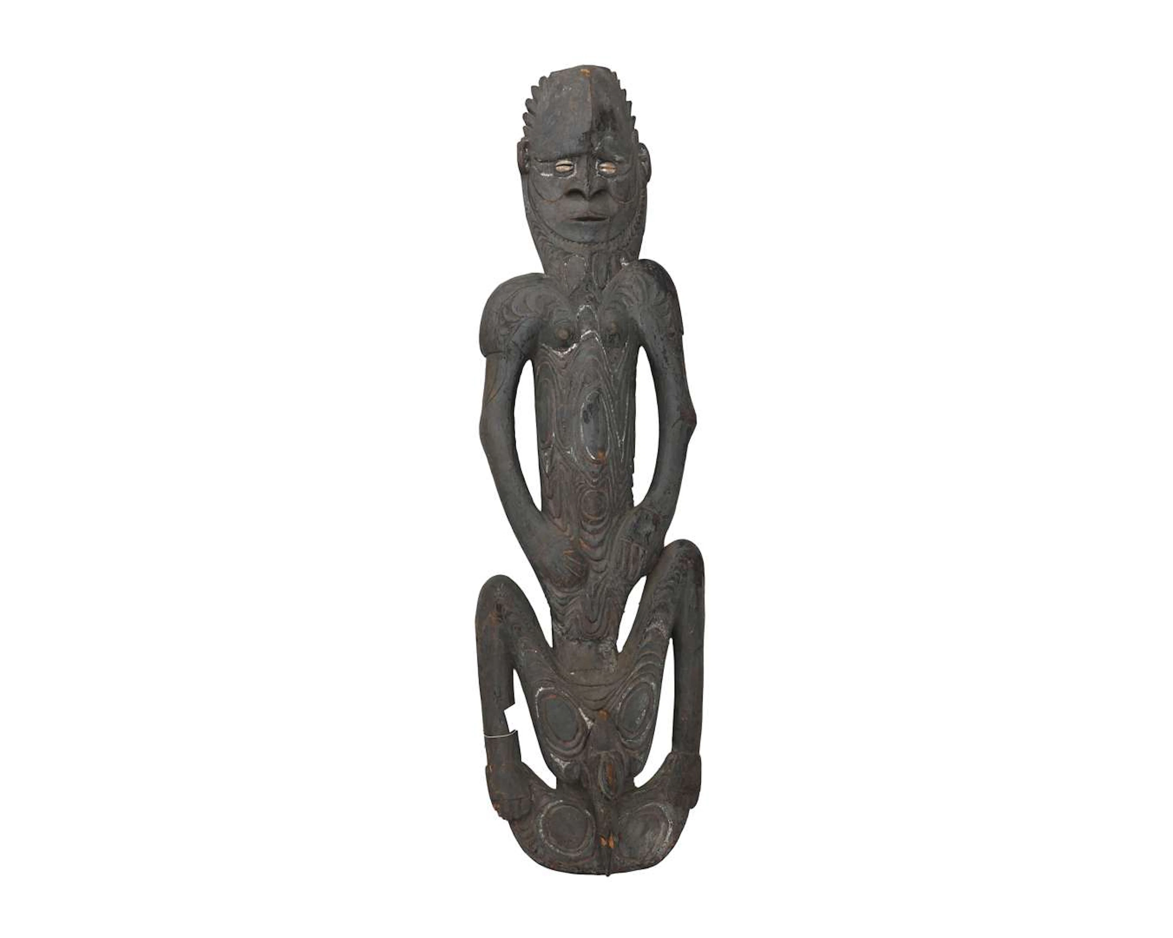 A wooden Sepik statue, Papua New Guinea, 20th century