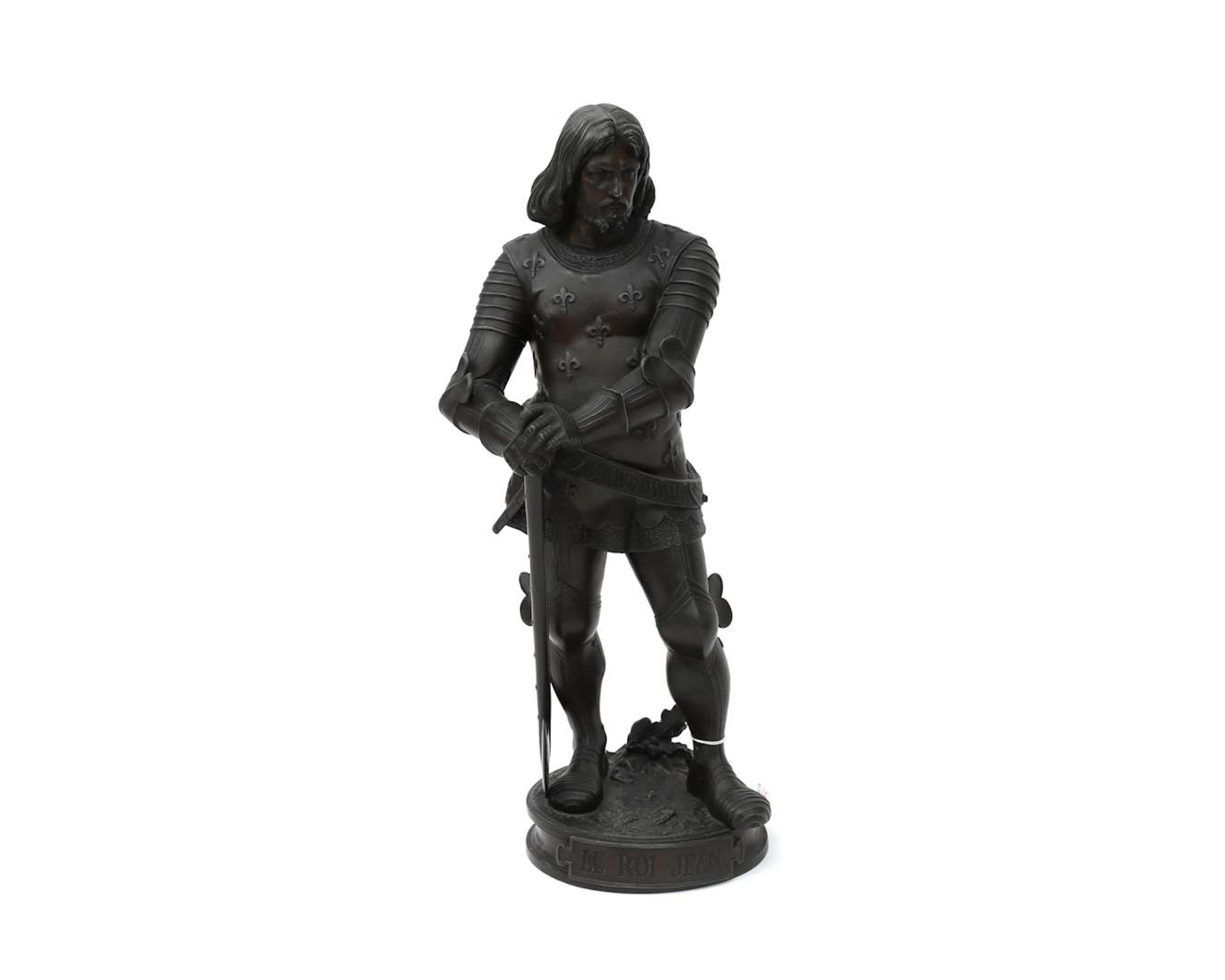 A metal sculpture in the style of Auguste Joseph Peiffer