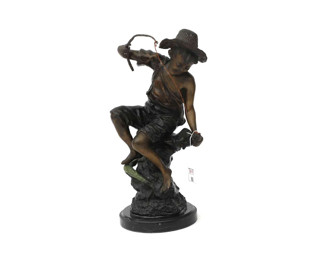 A bronze sculpture of a fisherman, 20th century