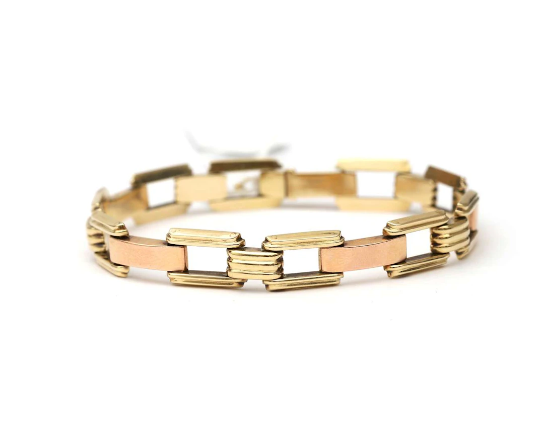 A 14ktwo-tone gold retro link bracelet, c. 1950