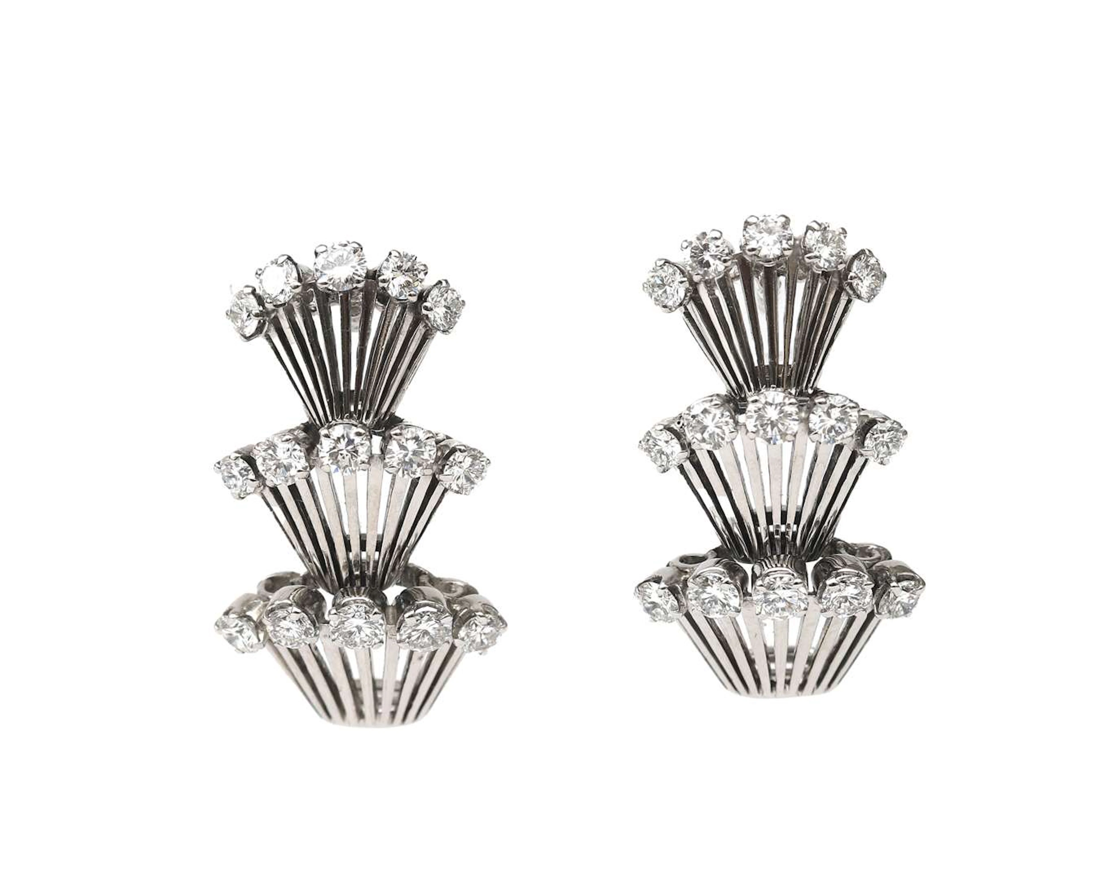 A pair of retro 14K white gold cascade earrings set with diamonds