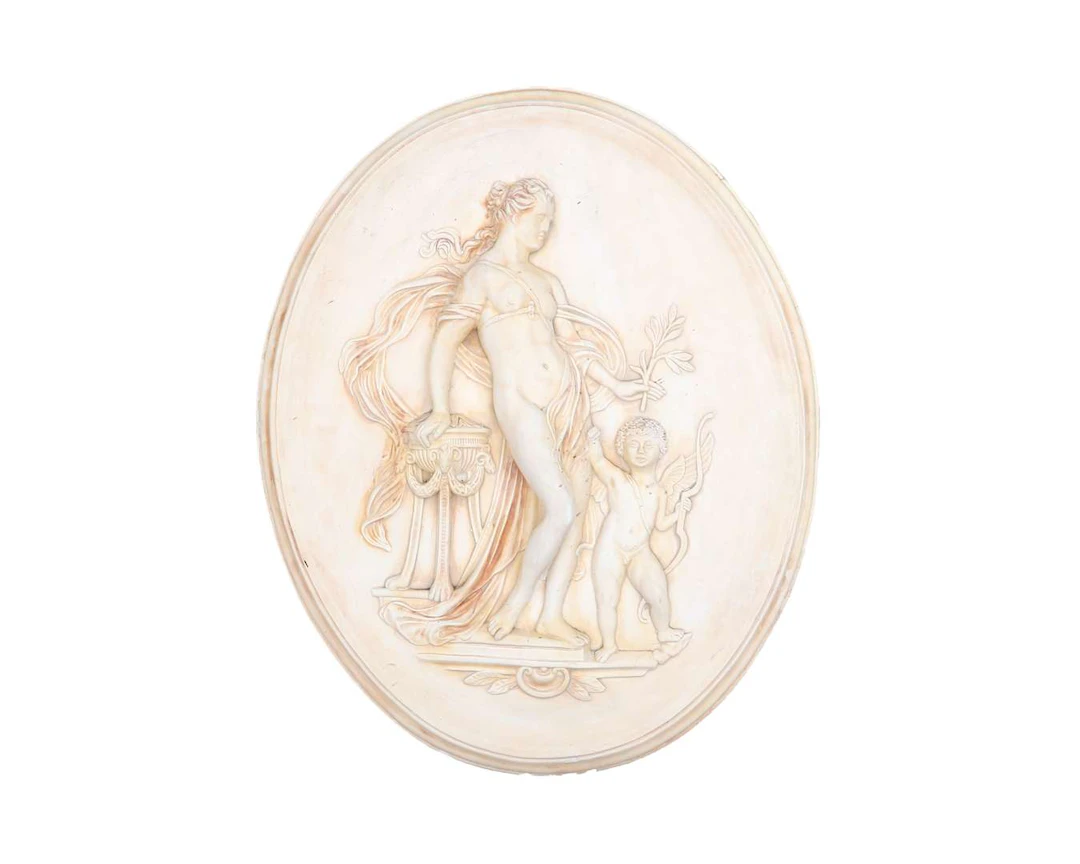 A plaster relief plaque, 20th century